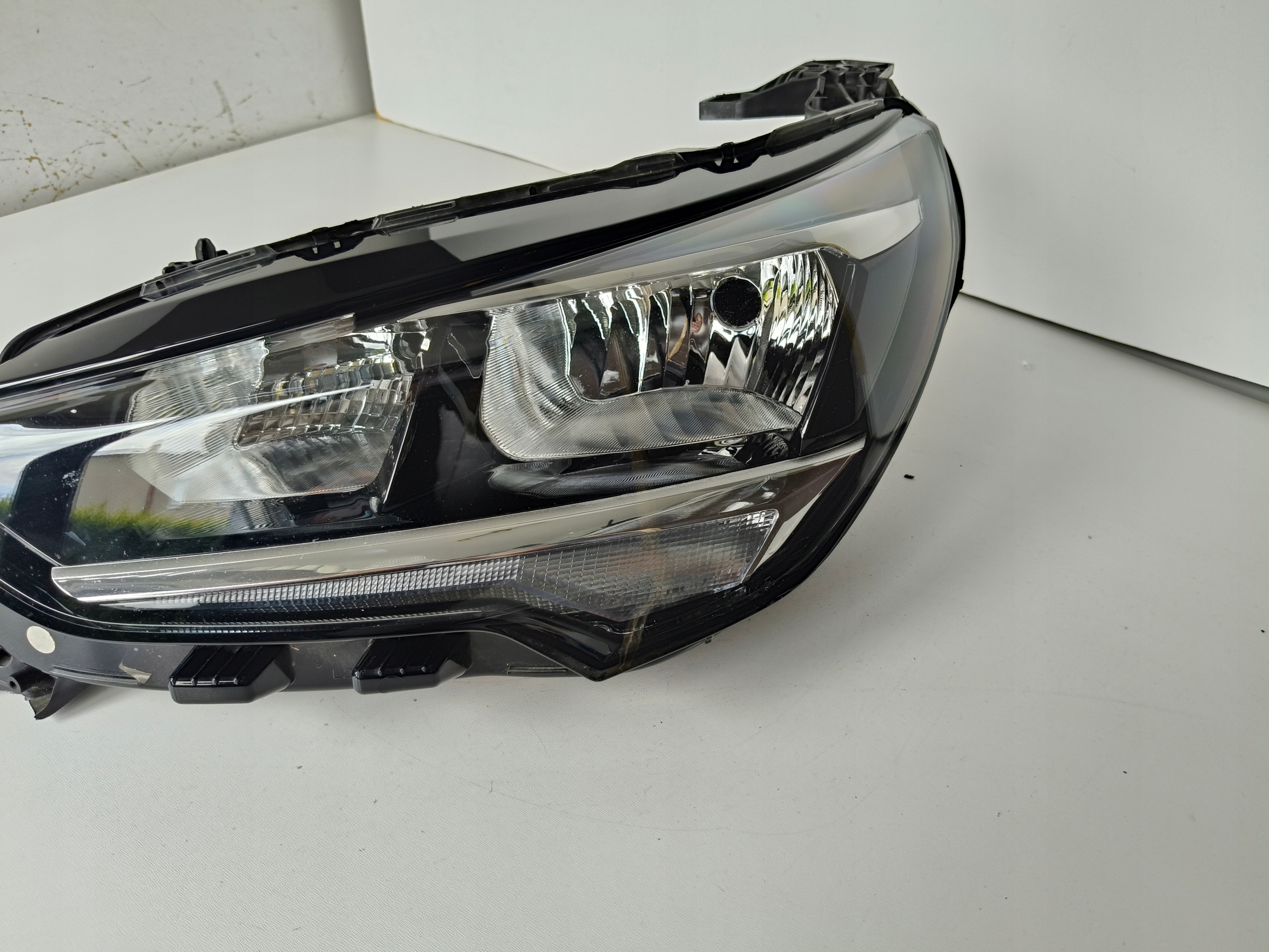 Licht links REFLEKTOR OPEL CORSA F 19