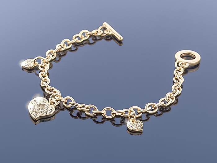 

Złota bransoletka Charms