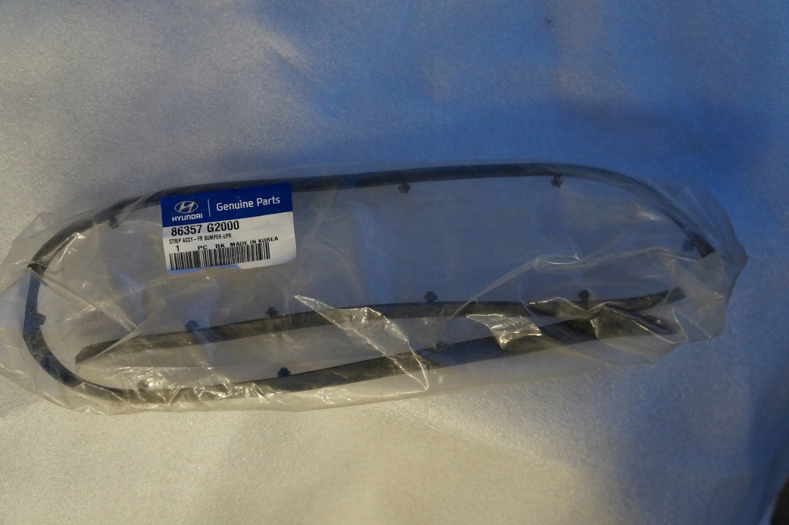 IONIQ ВЕРХНЯЯ ПРОКЛАДКА БАМПЕРА ПЕРЕДНЯЯ 86357G2000