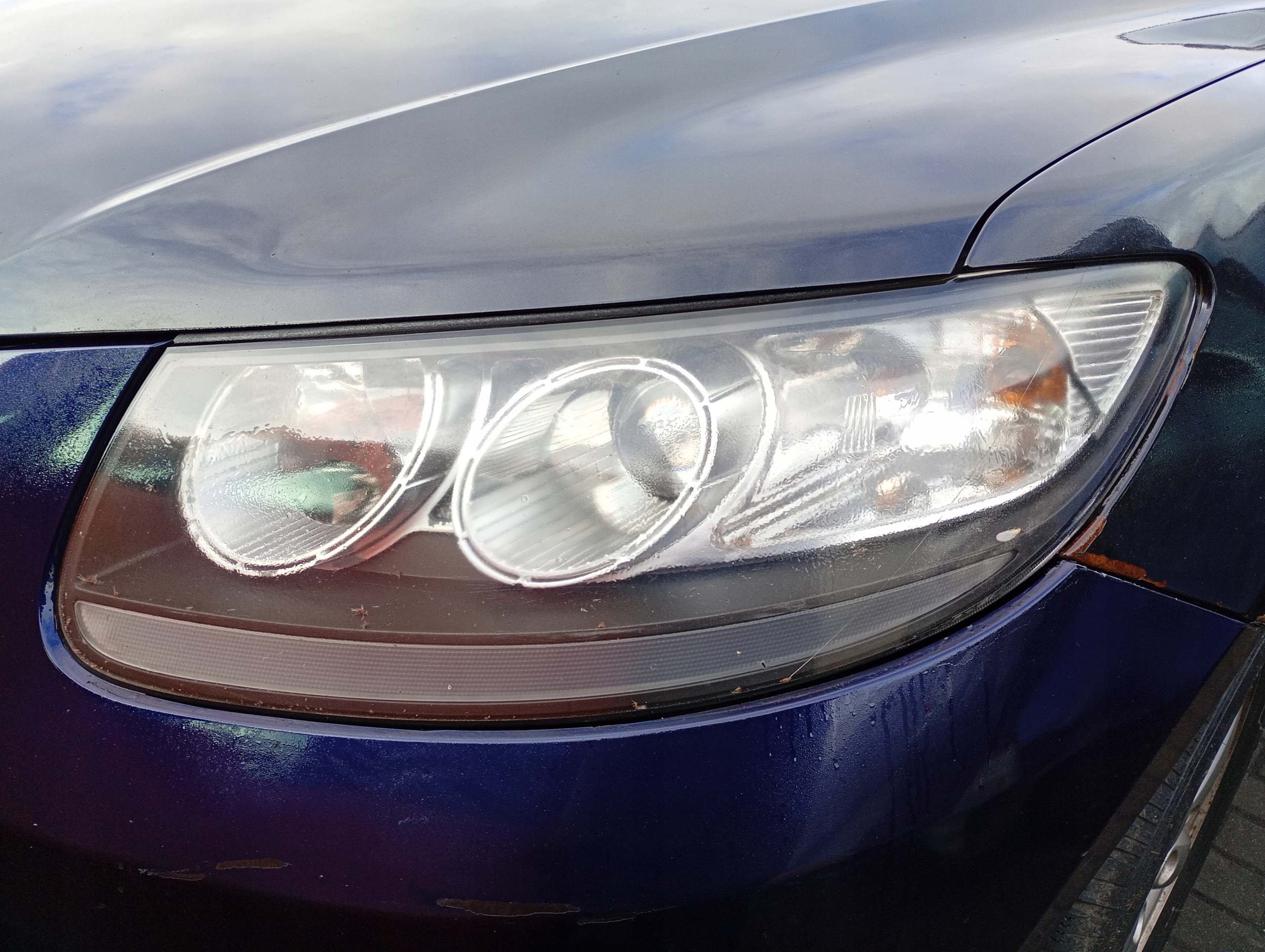 Hyundai Santa Fe 2 II 06-12 REFLEKTOR left light left front front
