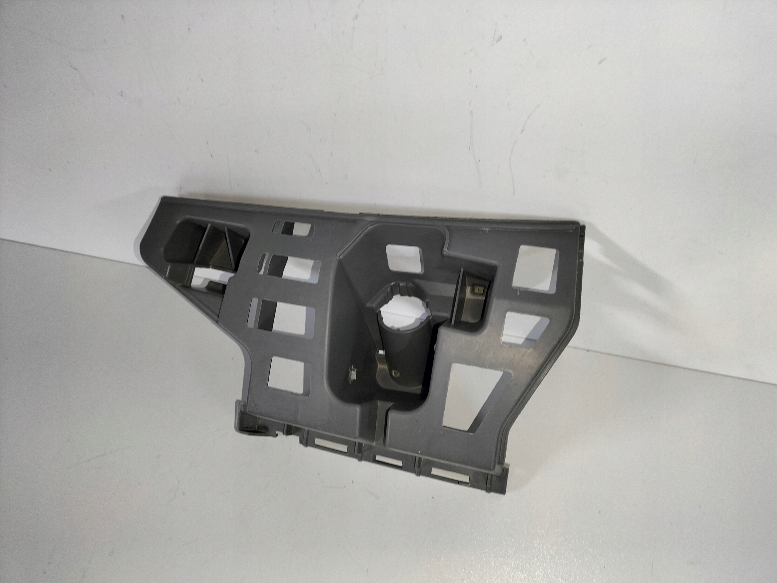 support holder of a bumper front left SKODA FABIA II LIFT 10-14