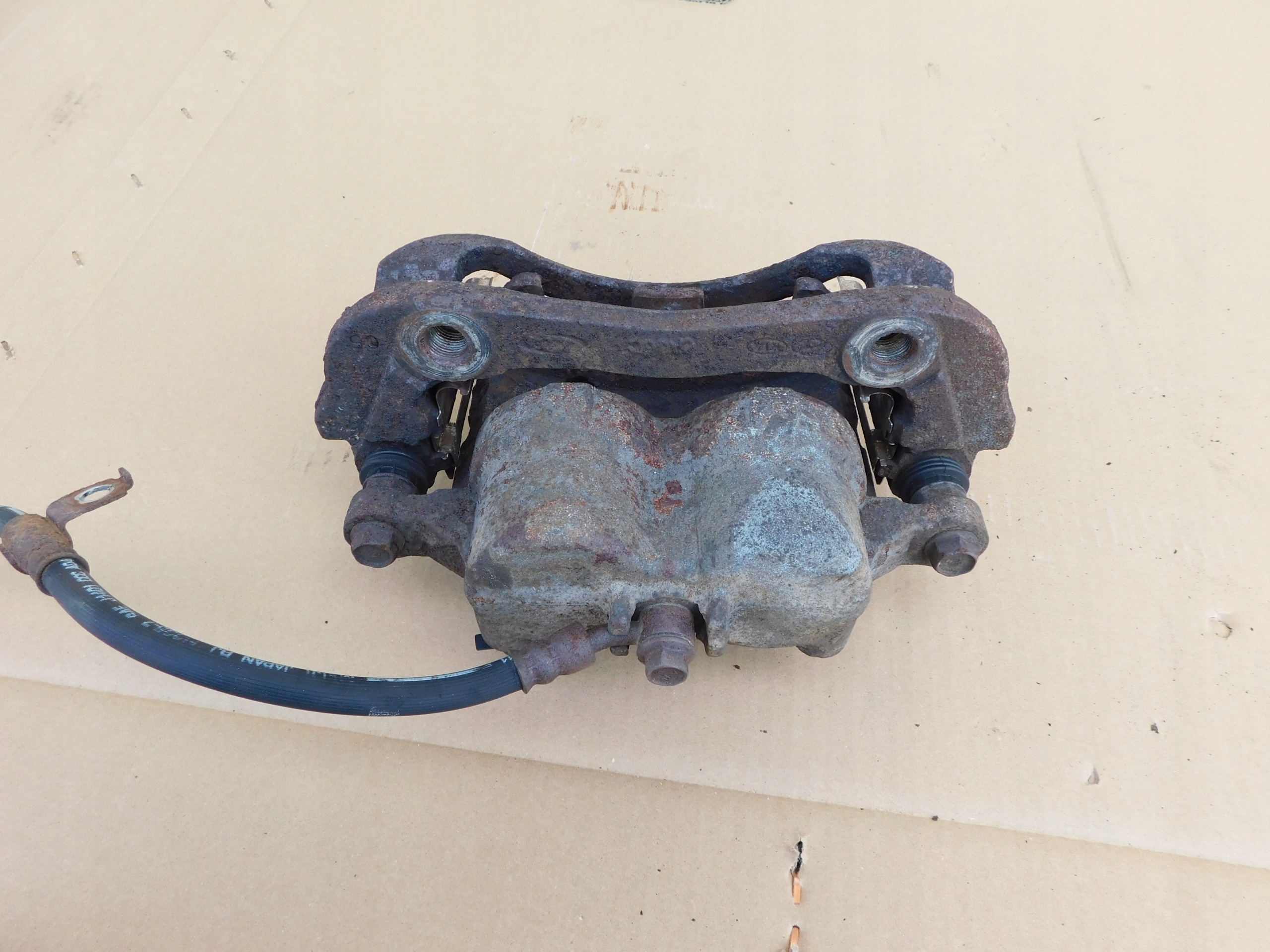 caliper brake left front + Jarzmo Hyundai H1 II Starex original