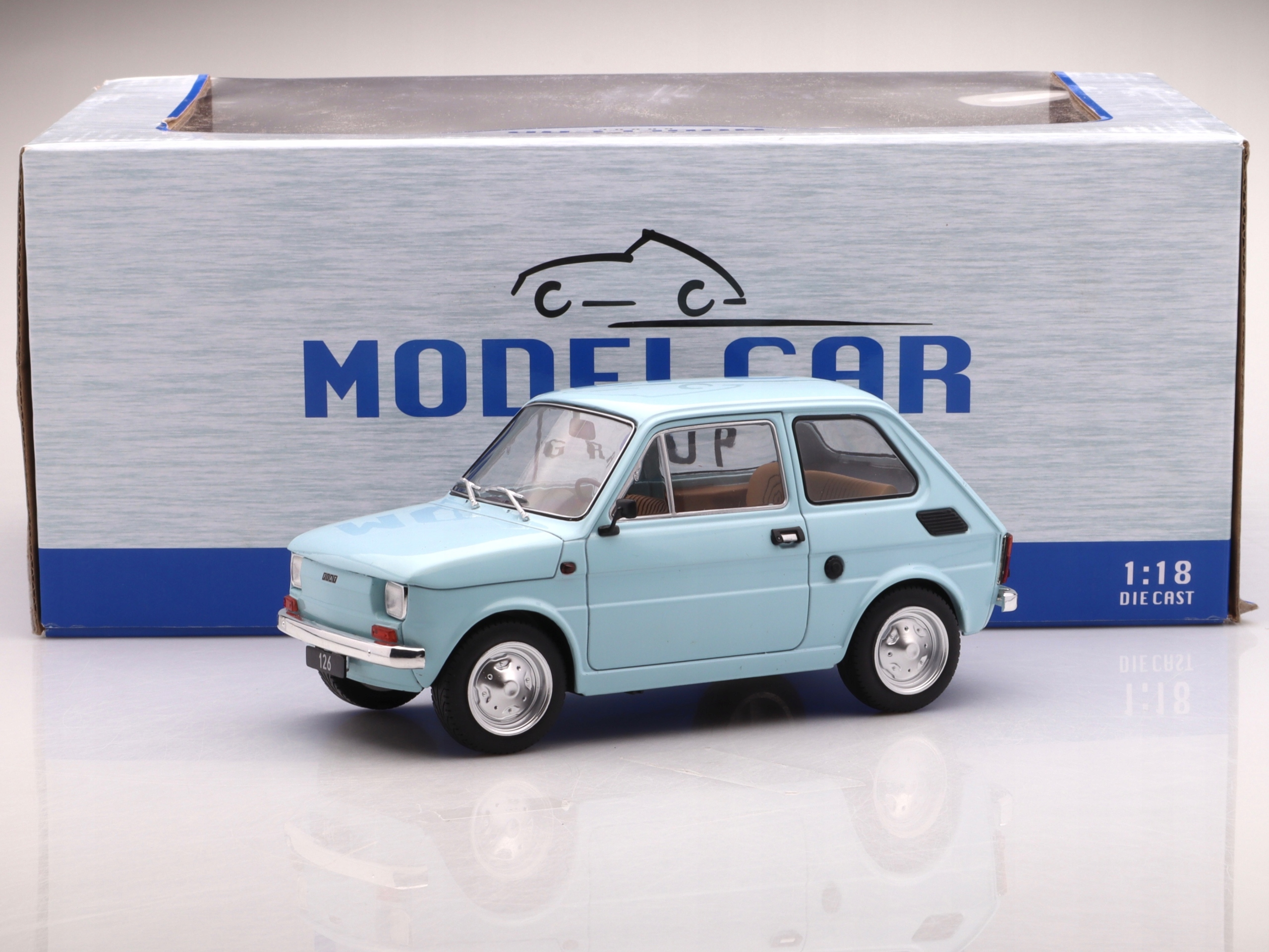 Fiat 126 1972, světle modrý Mcg 1:18