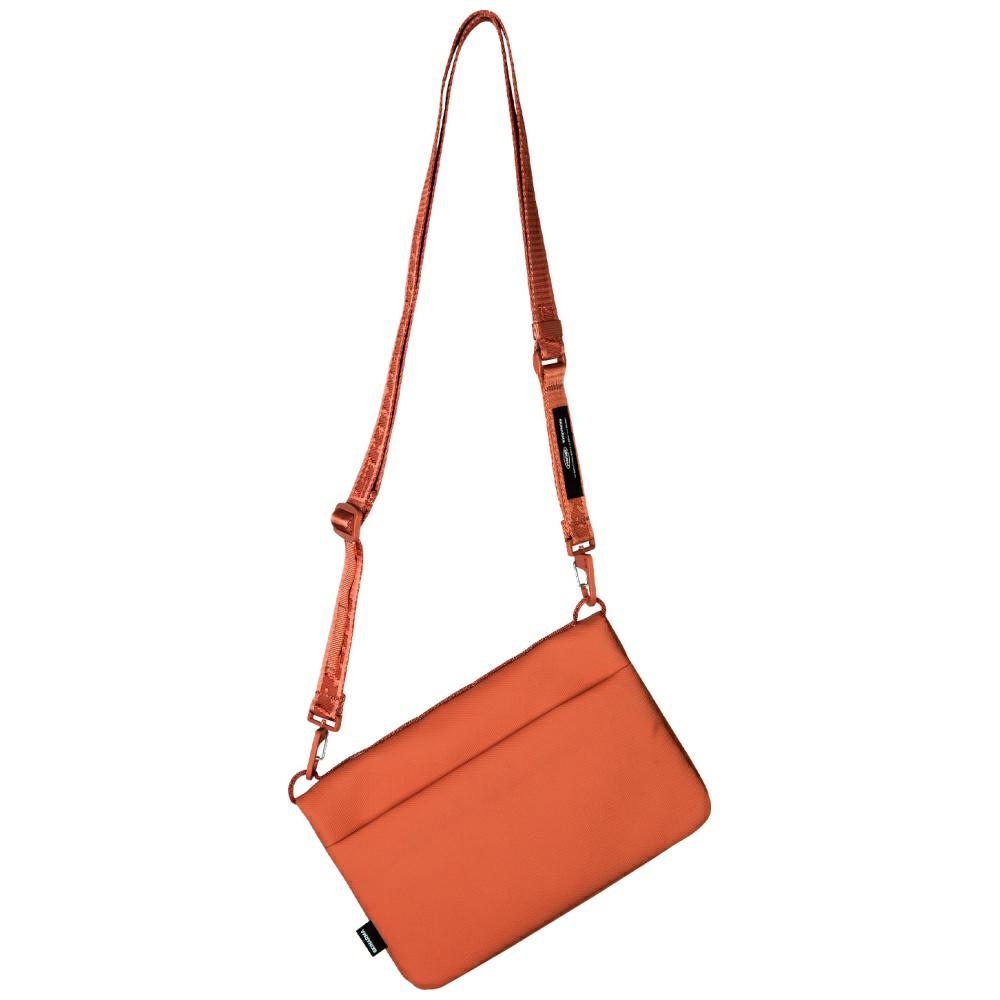 Crossbody kabelka Skinarma Juno oranžová