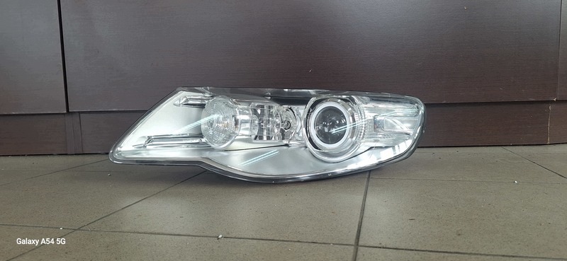 REFLEKTOR light front left VW TOUAREG BI-XENON 7L6941031C