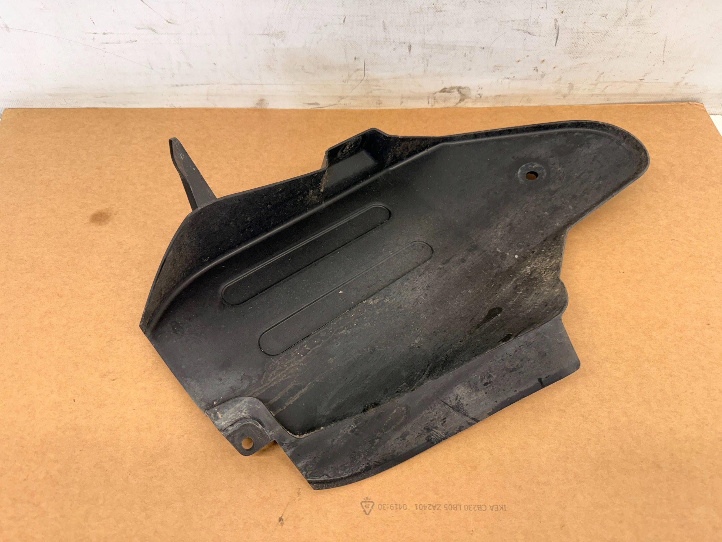 Dacia Spring mudguard left rear part left rear. 767495540R