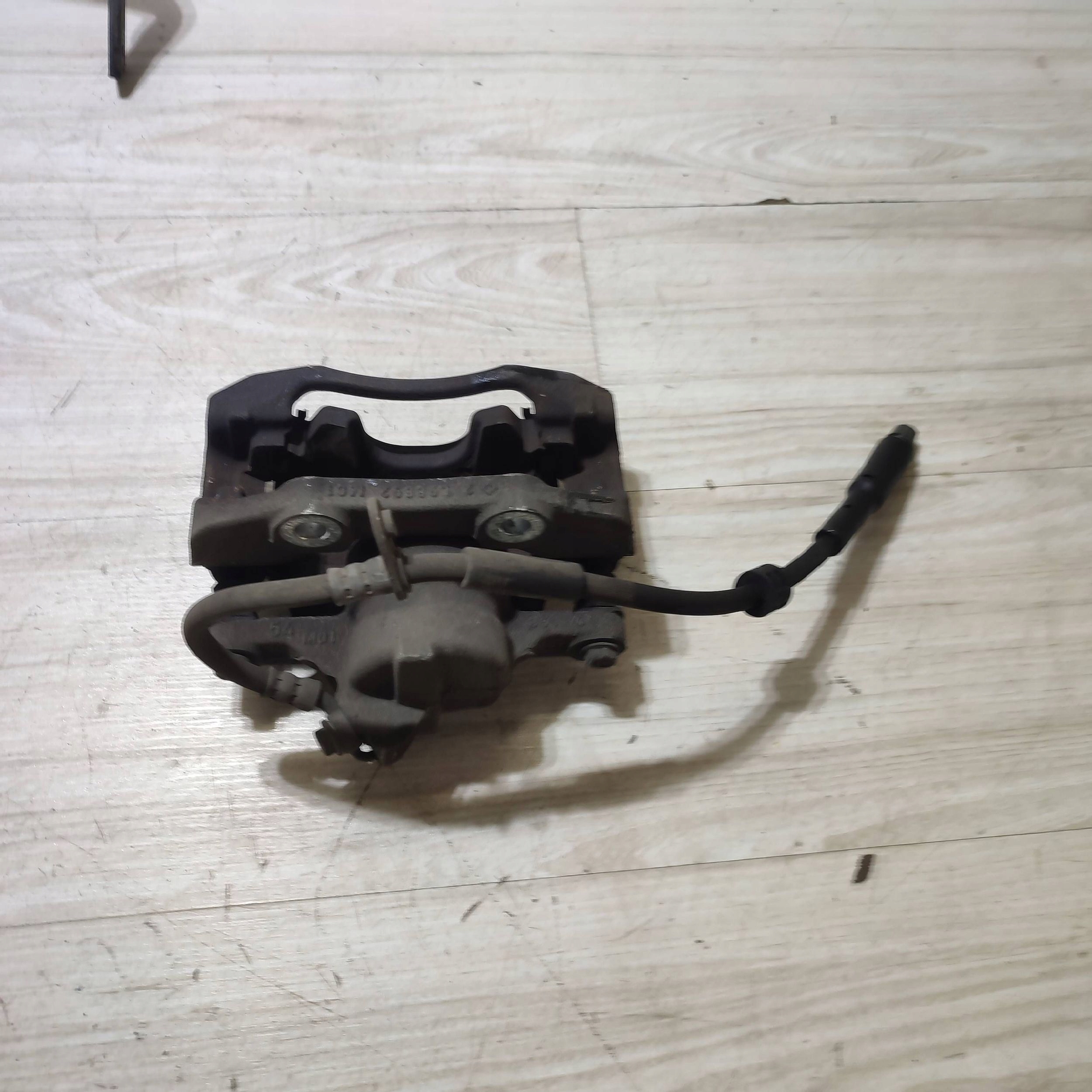 caliper brake front front side right Opel Corsa F 9824176680
