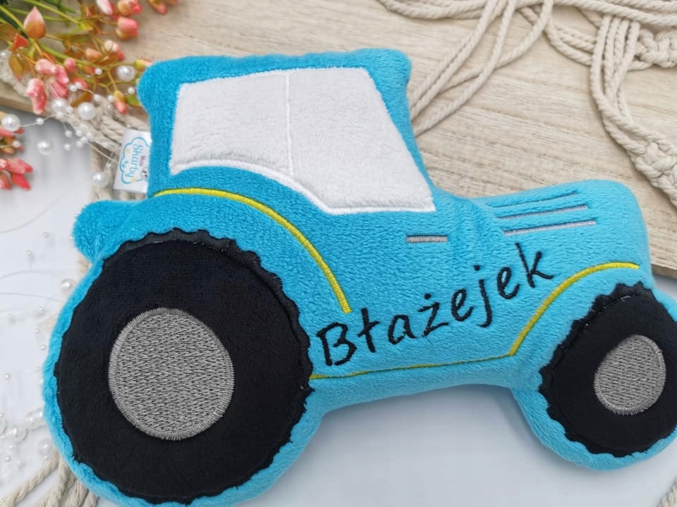 pluszowy traktor z imieniem Bohater Inny