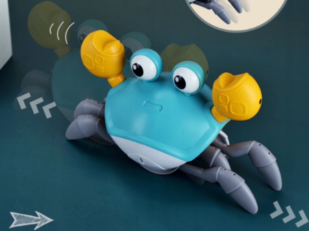 UCIEKAJĄCY PEŁZAJĄCY KRAB CHODZĄCY ZABAWKA INTERAKTYWNA DLA DZIECKA LED XL Kolor dominujący odcienie niebieskiego