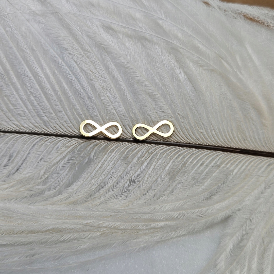 Zlaté náušnice s tyčinkou – nekonečno p.585