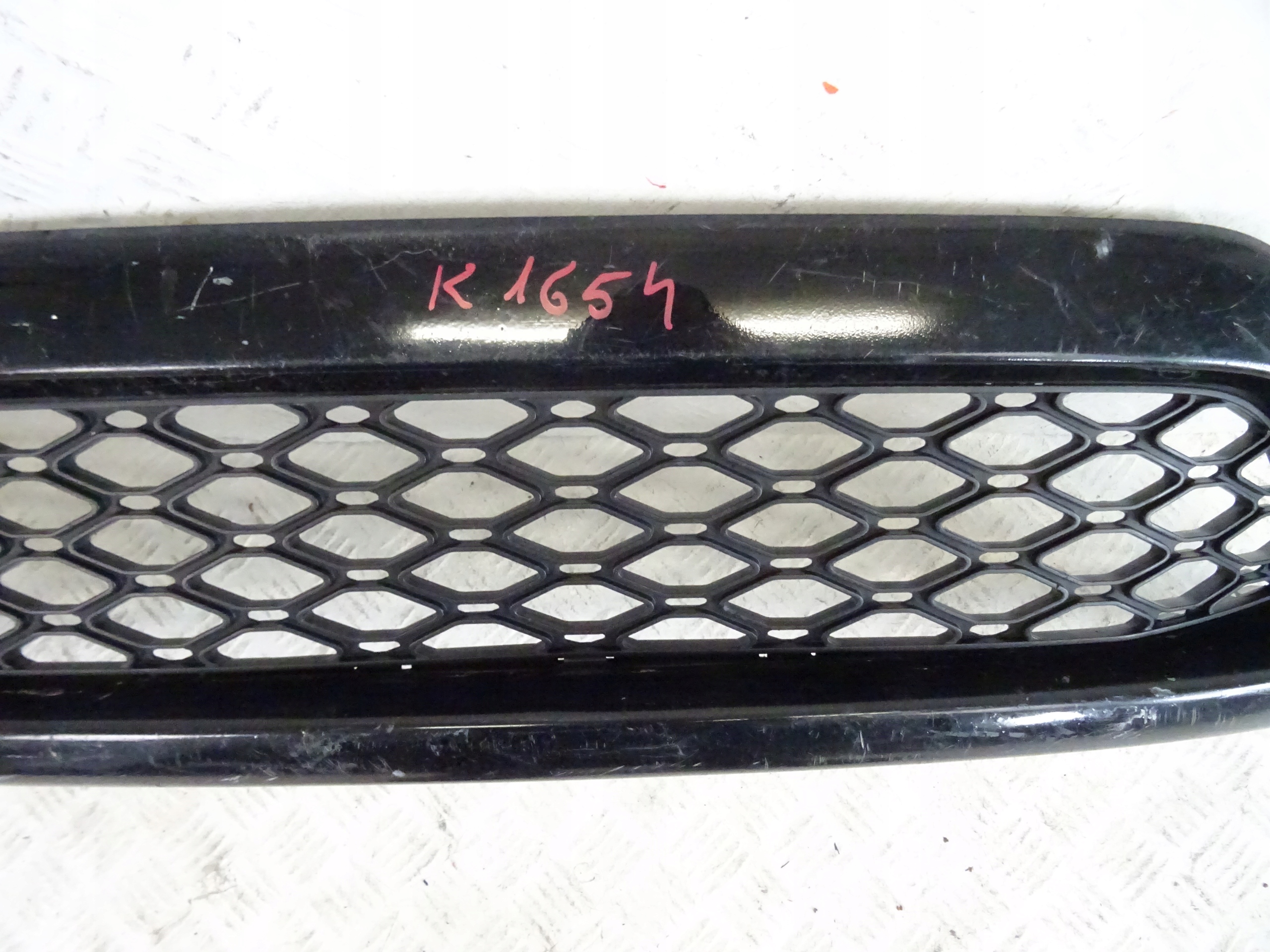 grid of a bumper front front KIA RIO 86523-1G600 08-11