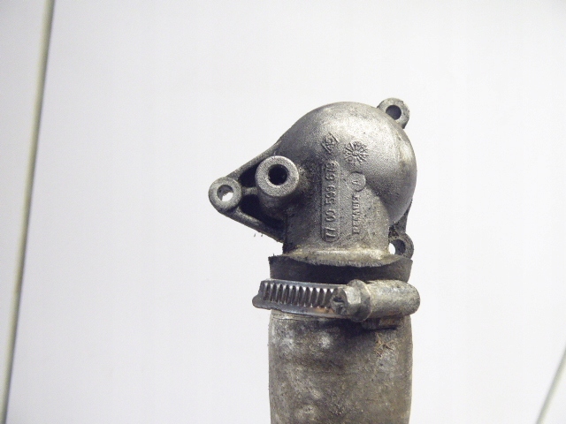 CLIO I OBUDOWA TERMOSTATU WĄŻ 7700599679 1.9 D Producent części Renault OE