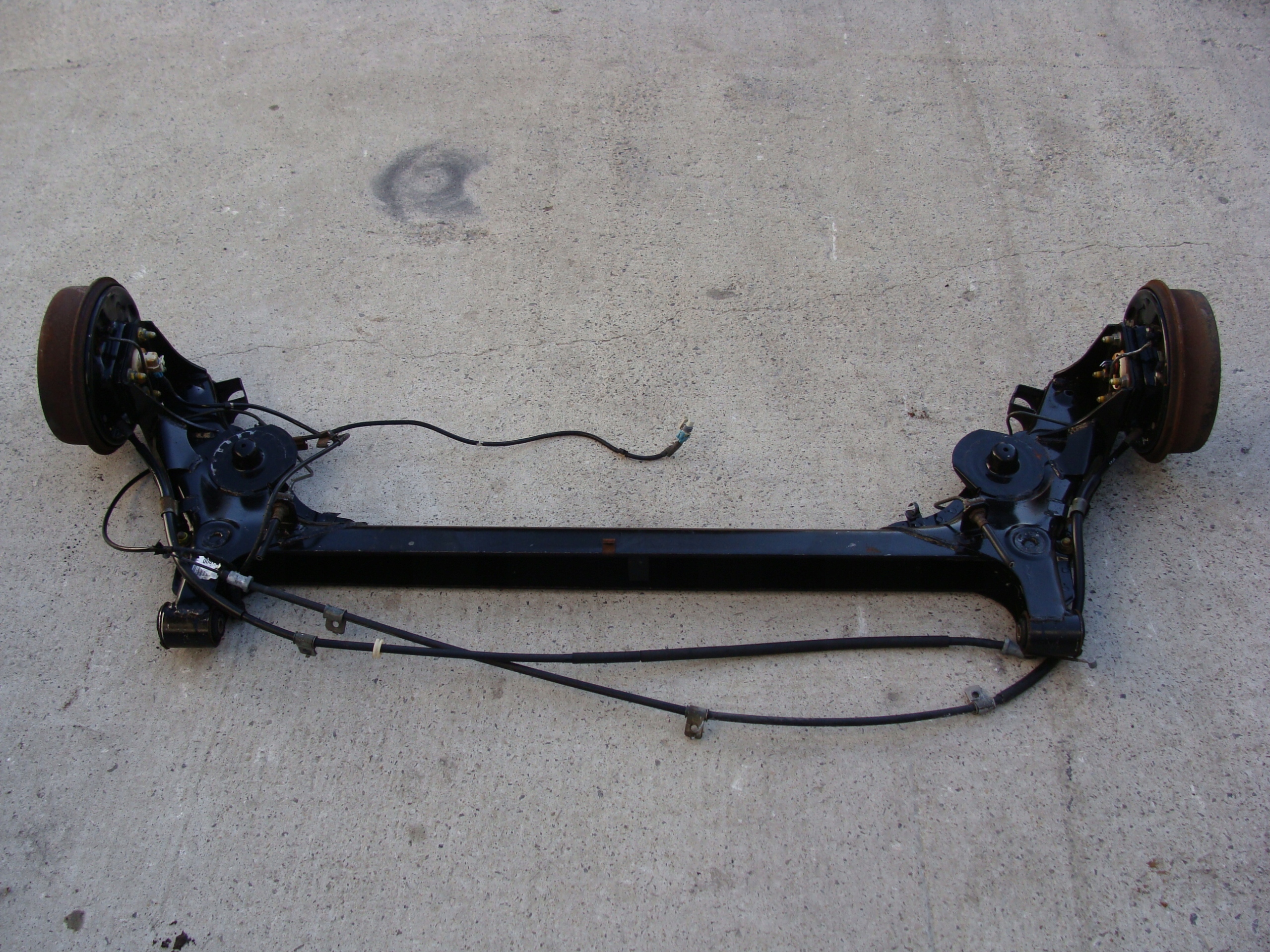 BELKA OŚ TYLNA OPEL CORSA B ABS !!