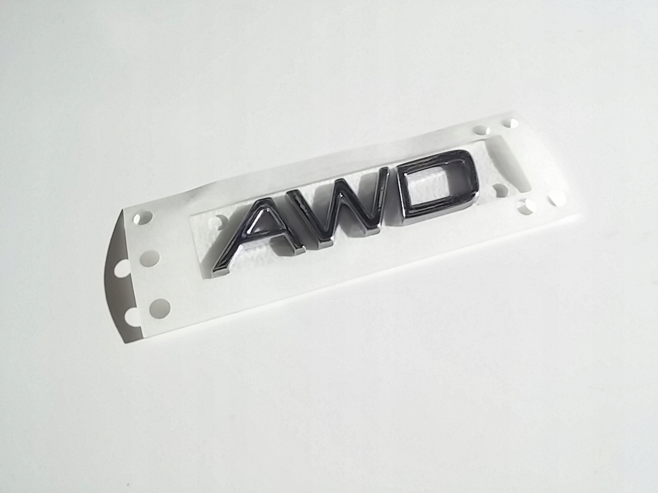 

Volvo Awd emblemat na tylna klape 9157130 Oe