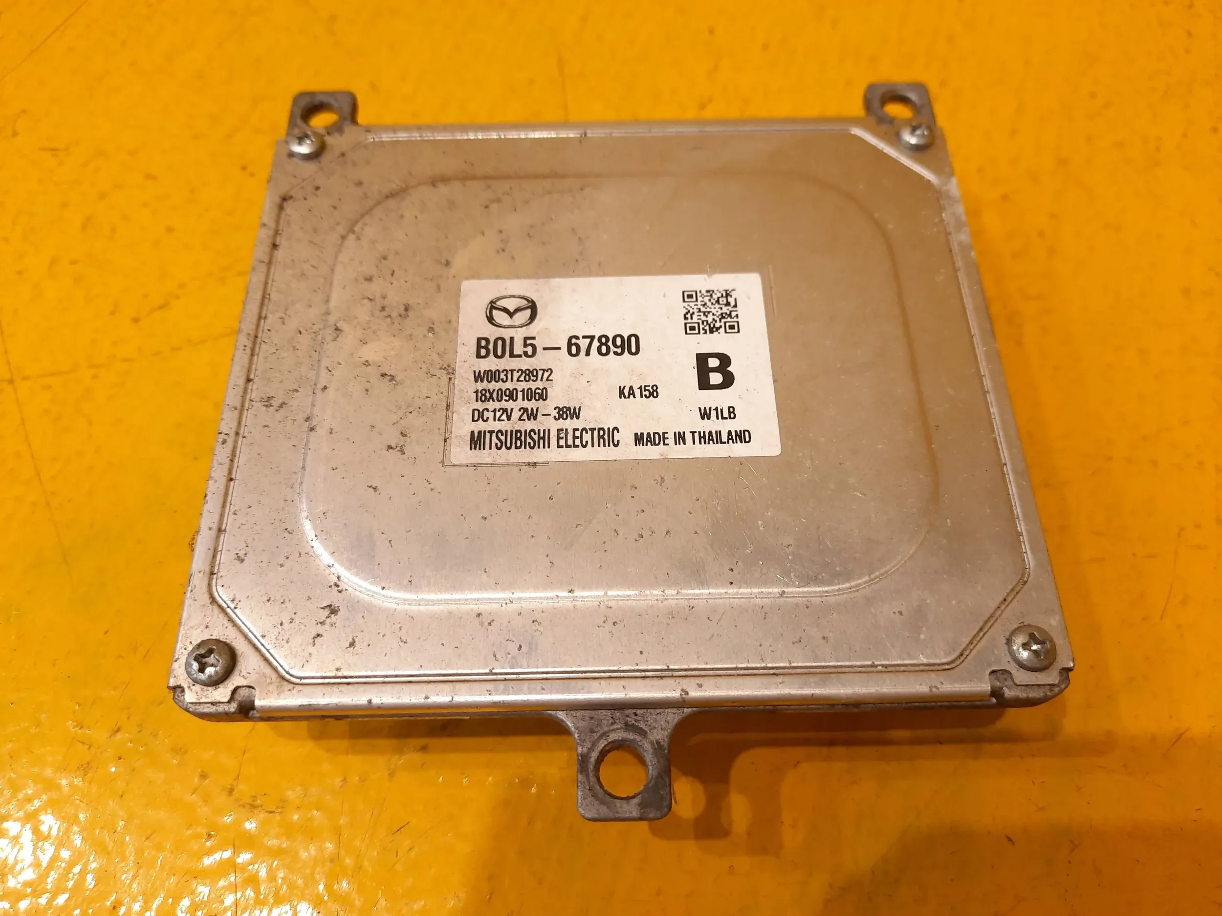 Mazda 3 BP MODUŁ ŚWIATEŁ PRZETWORNICA B0L5 67890 Producent części Mazda OE