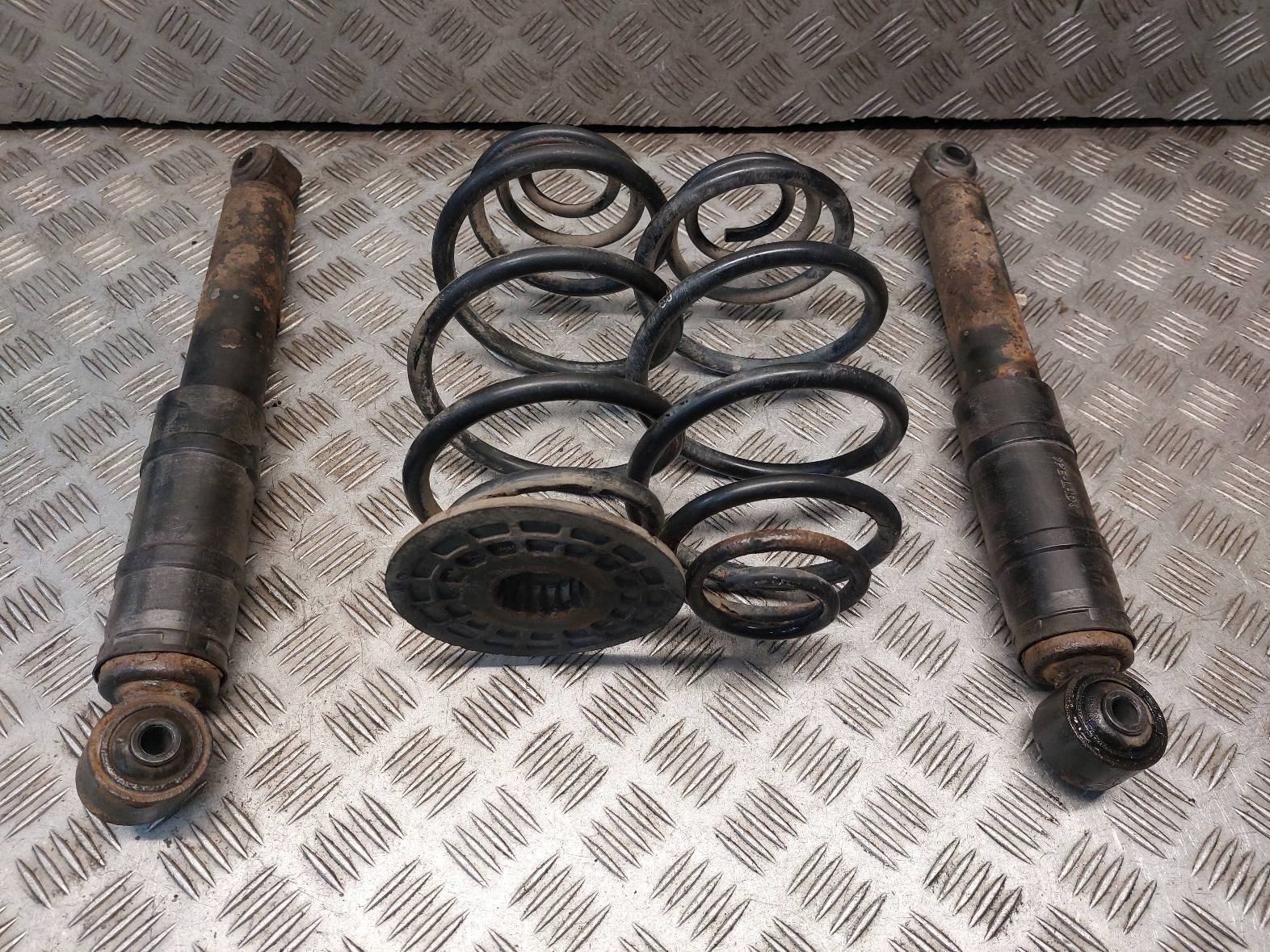 shock absorber + spring left rear part + right rear part OPEL ASTRA H 22214571