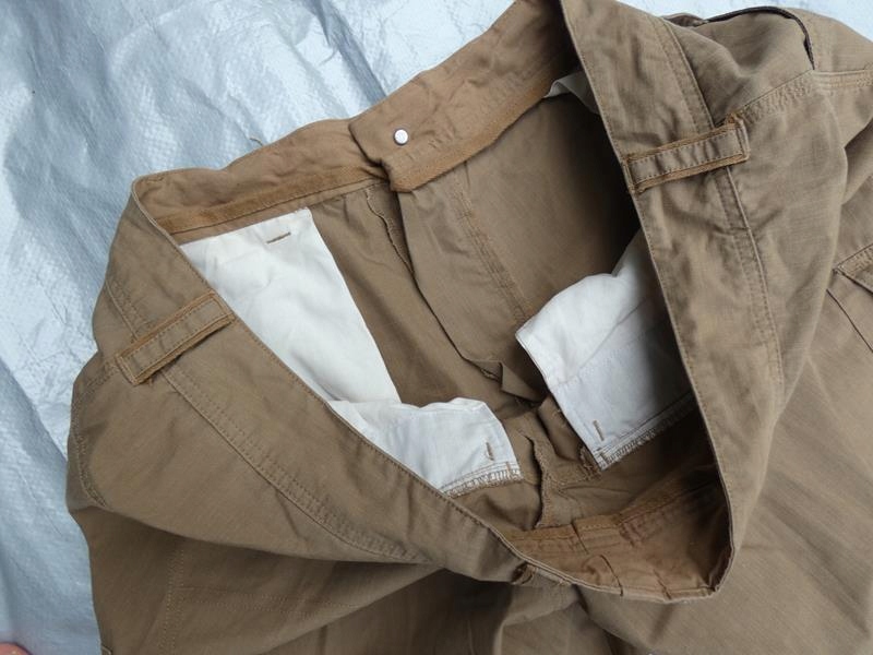 Spodnie trekking Forclaz Travel 100 beżowe khaki Długość nogawki od kroku 86 cm