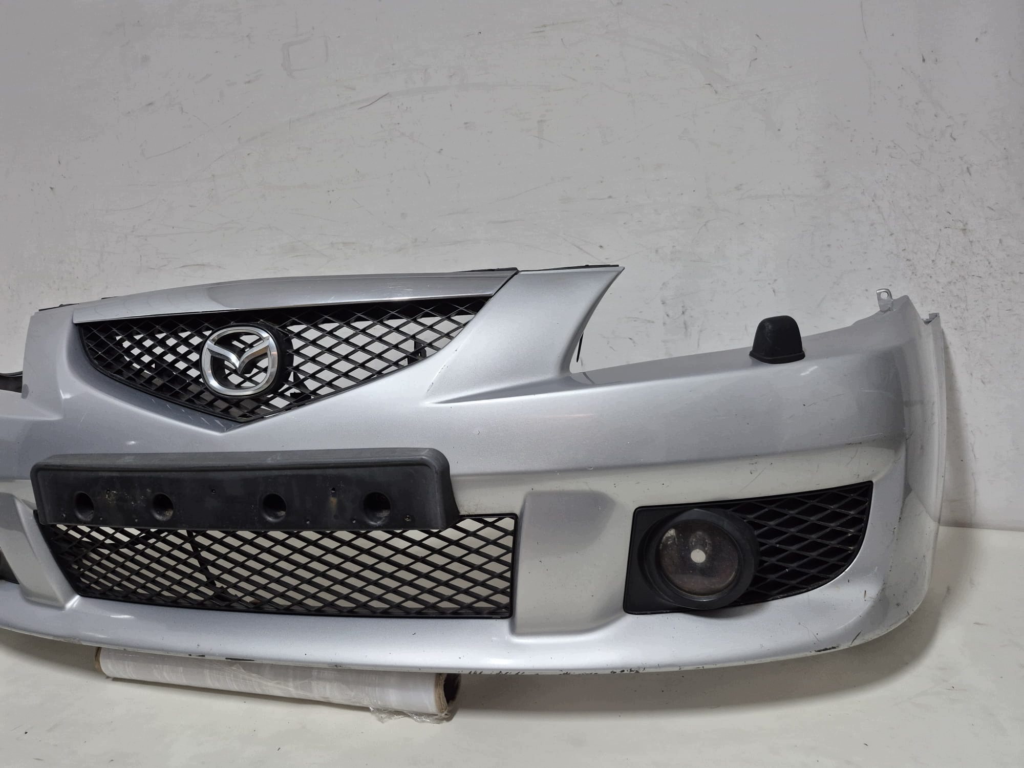 MAZDA PREMACY LIFT 01- bumper front front SPR C145-50031