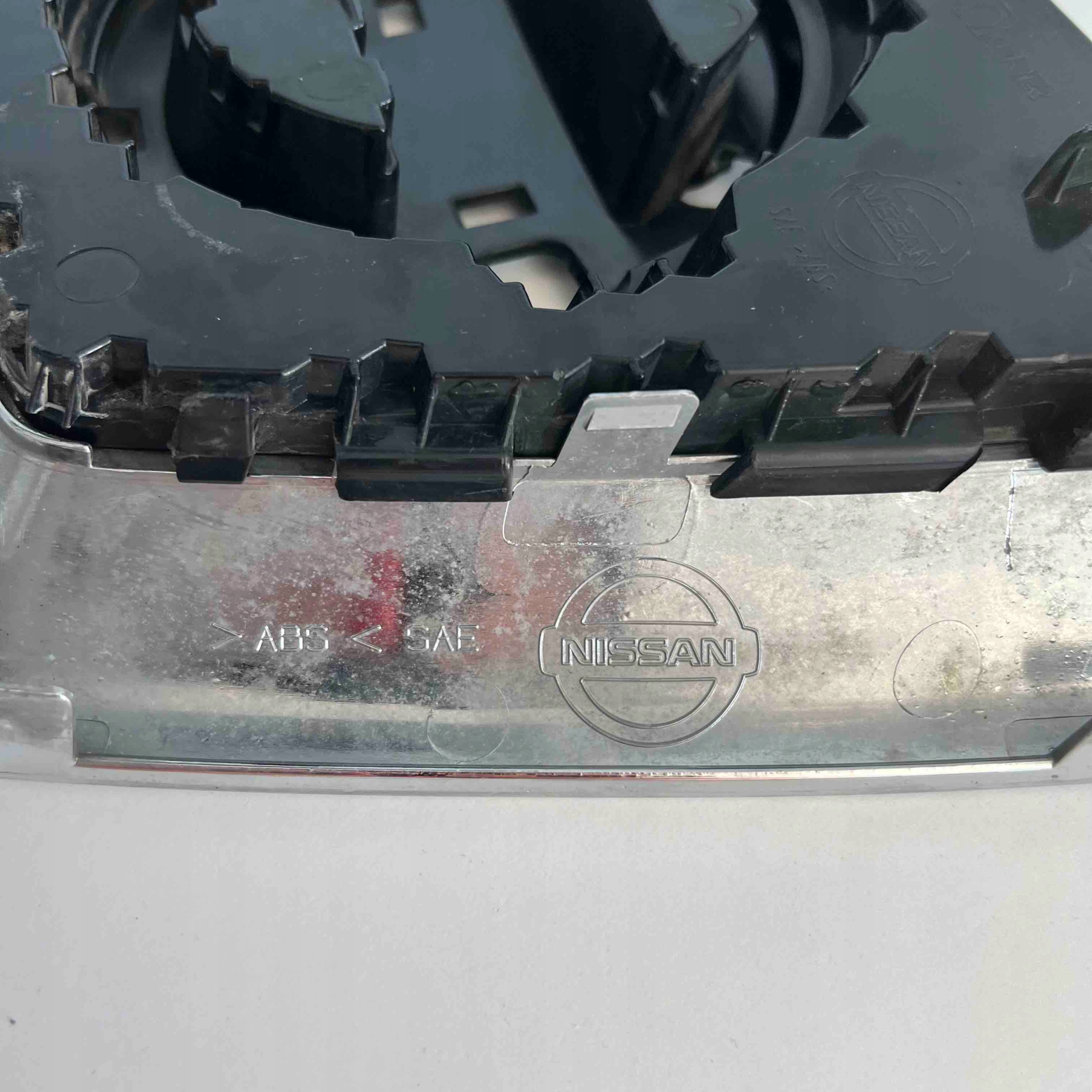 Nissan Qashqai 06-09 Grille Grille Logo 62314JD00A