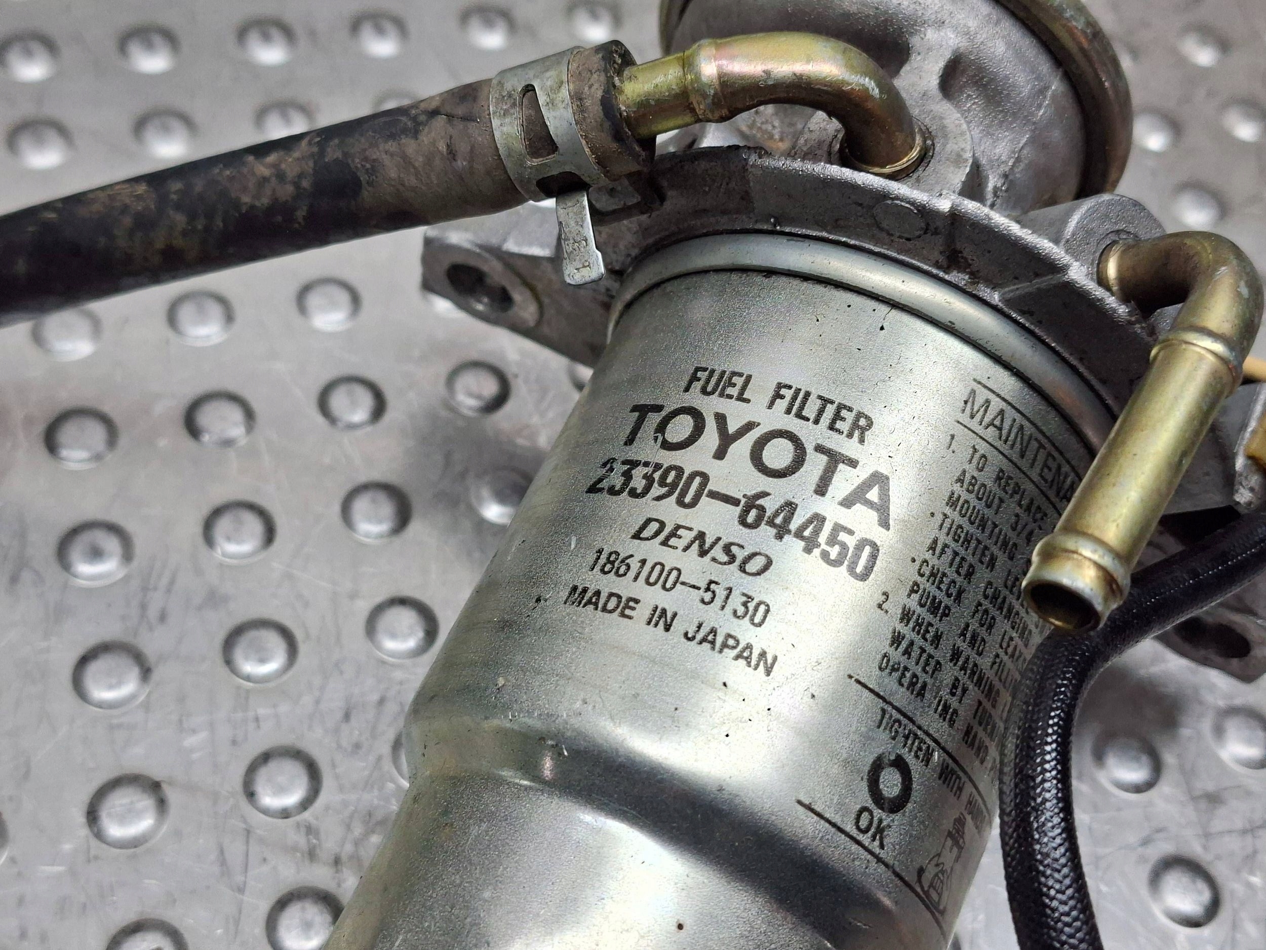 držač filtera goriva TOYOTA COROLLA E12 02- 2.0 D4D 23390-64450