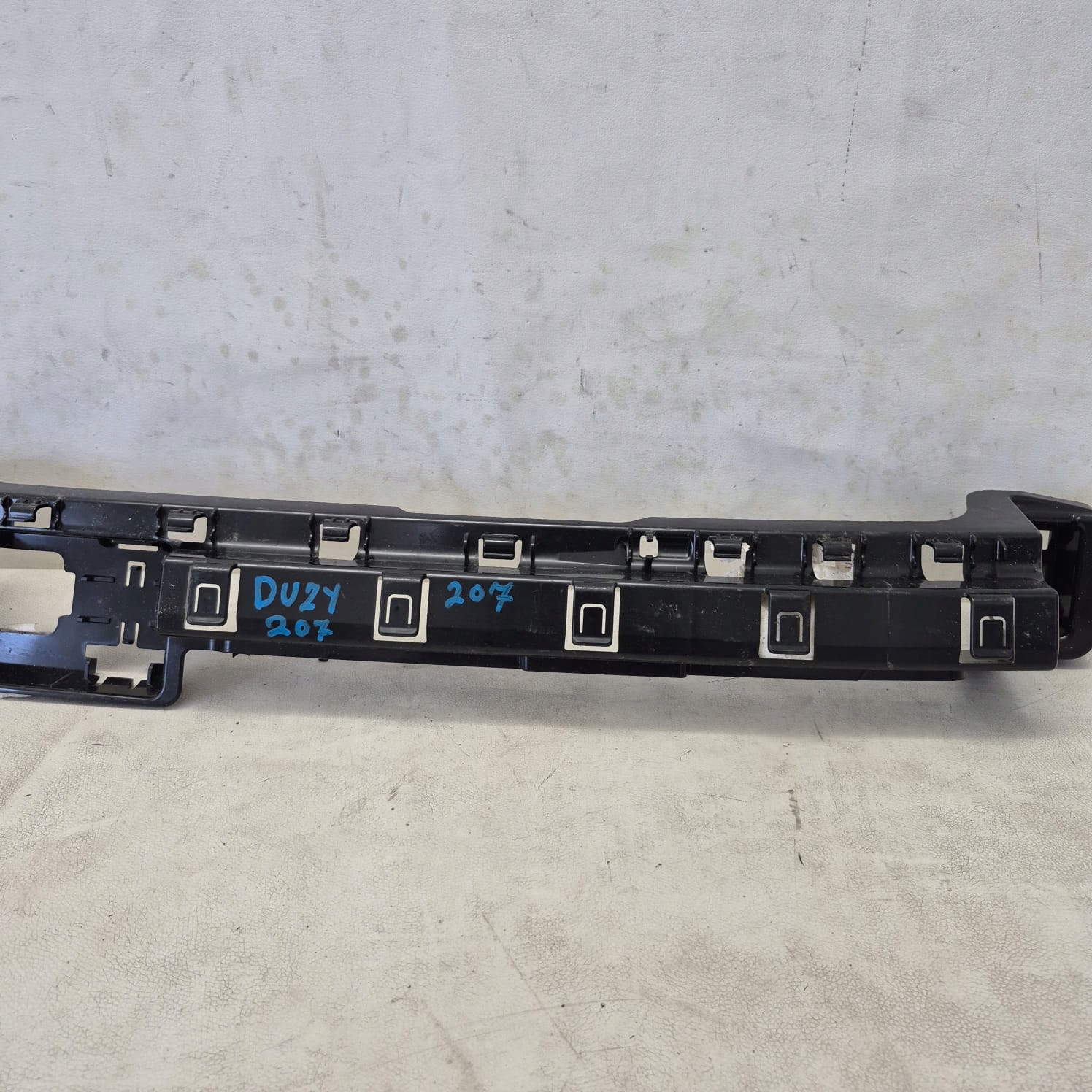 BMW X1 U11 22-> support console holder of a bumper rear part