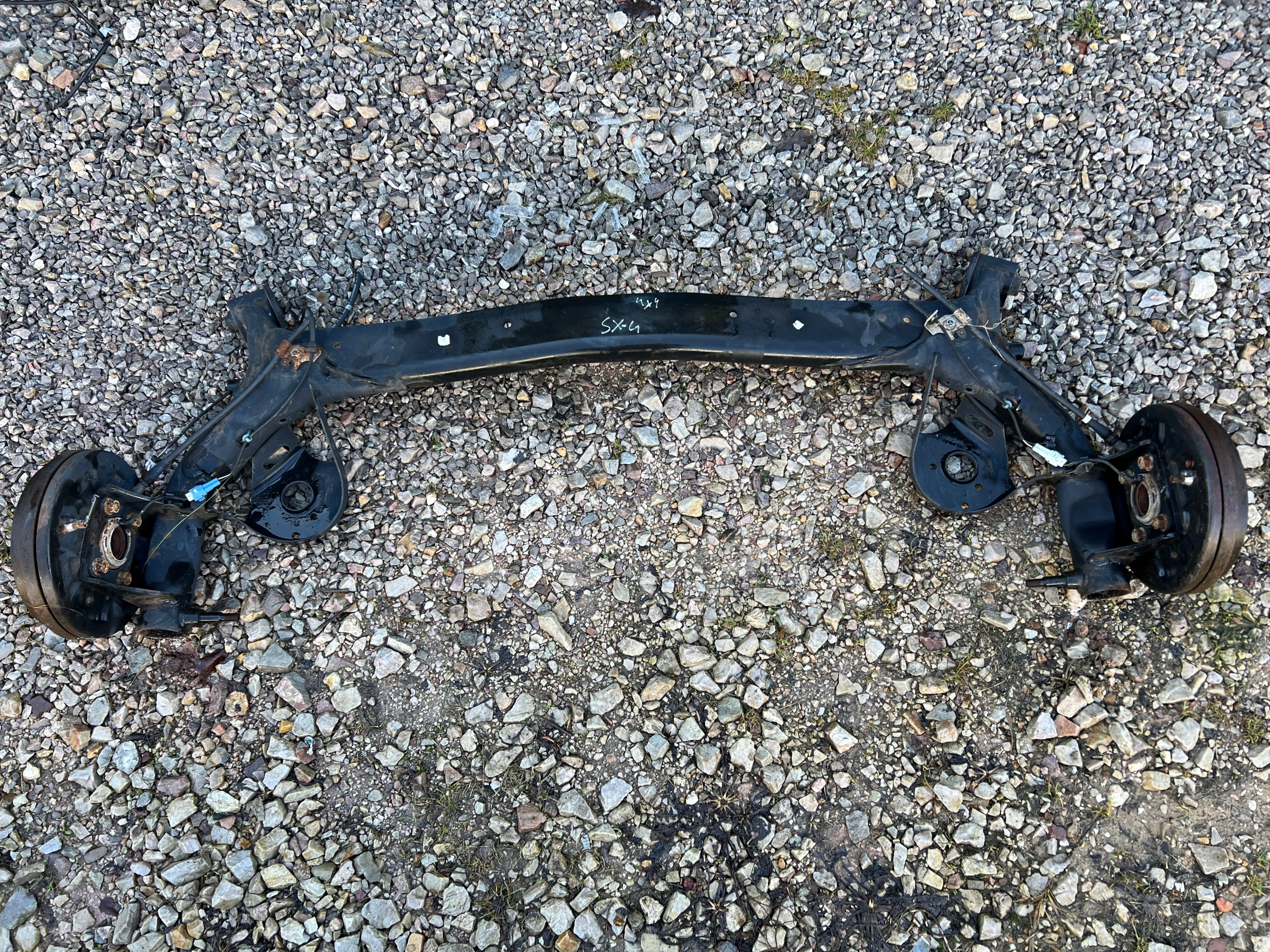 FIAT SEDICI SX4 SX-4 ZAWIESZENIE BELKA OŚ TYŁ TYLNA