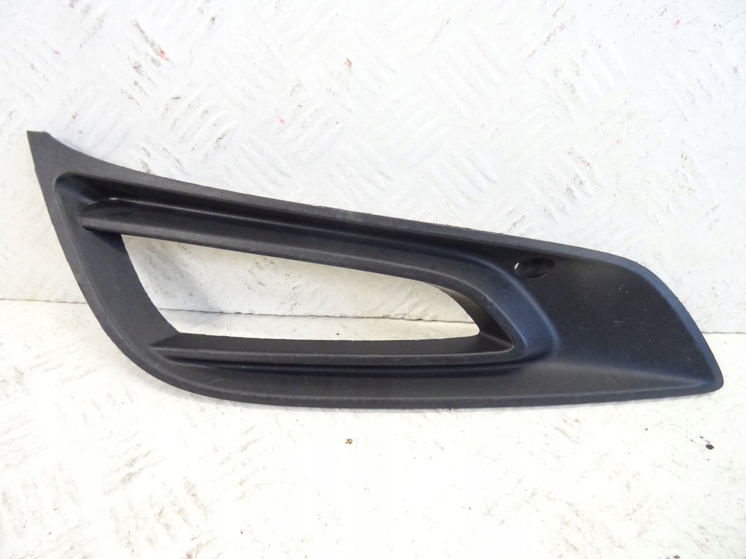 grid of a bumper front left OPEL ASTRA V K 13481939