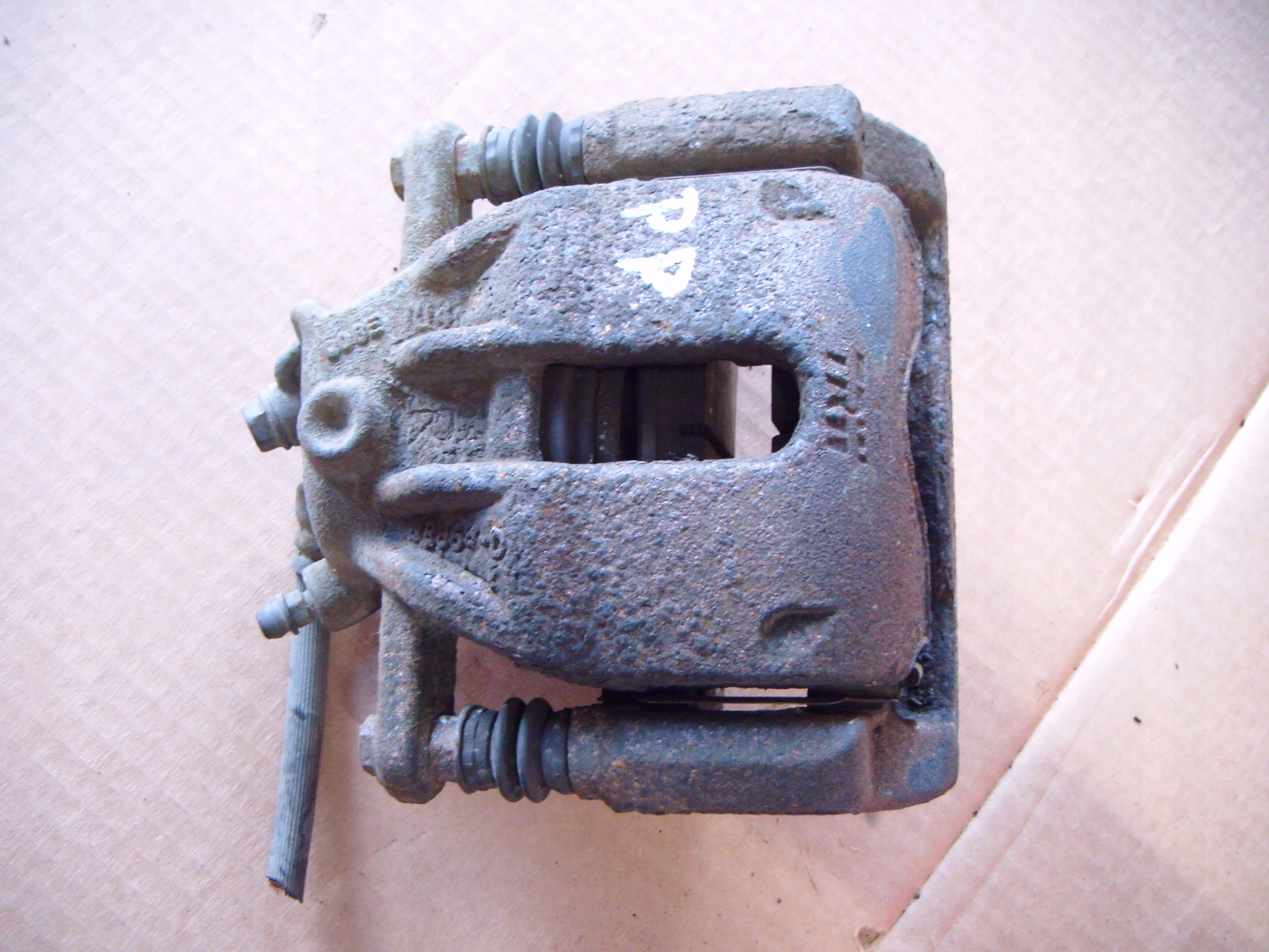 MICRA K12 03-10 1.2 ZACISK HAMULCOWY PRAWY PRZÓD