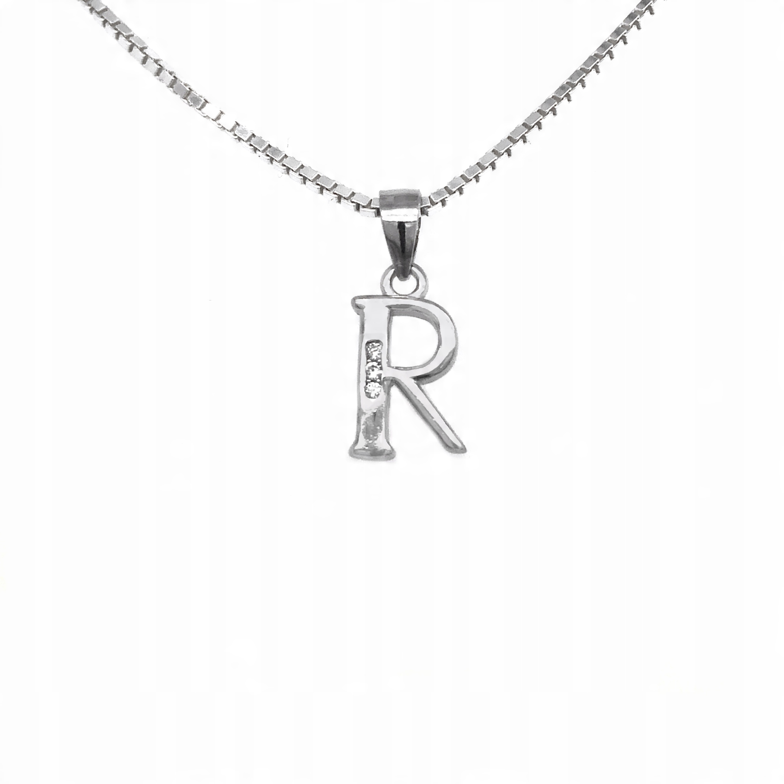 

Literka srebrna "r" wisior