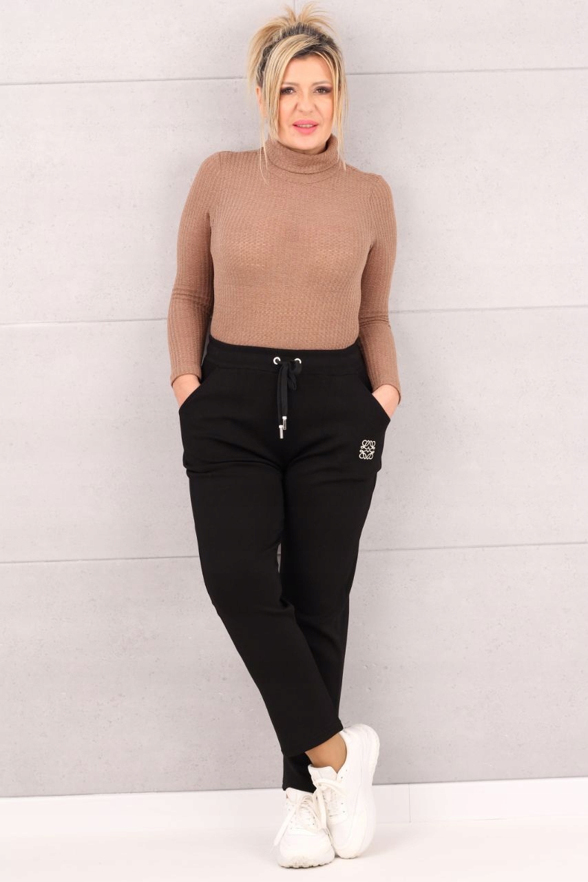 WYGODNE SPODNIE DRESOWE DAMSKIE NA GUMCE Z KIESZENIAMI ELASTYCZNE Marka FEMIMODA