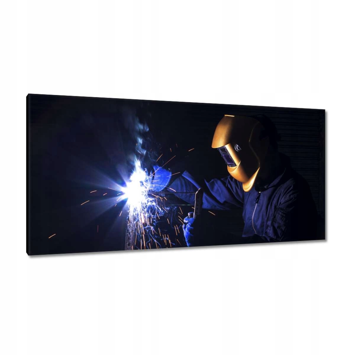 Obrazy 115x55 Svařovací stroj svařuje kov