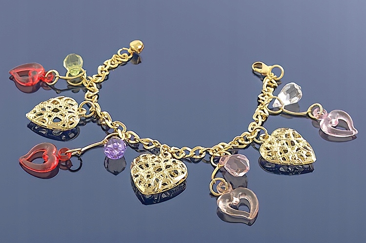 

Złota bransoletka Charms