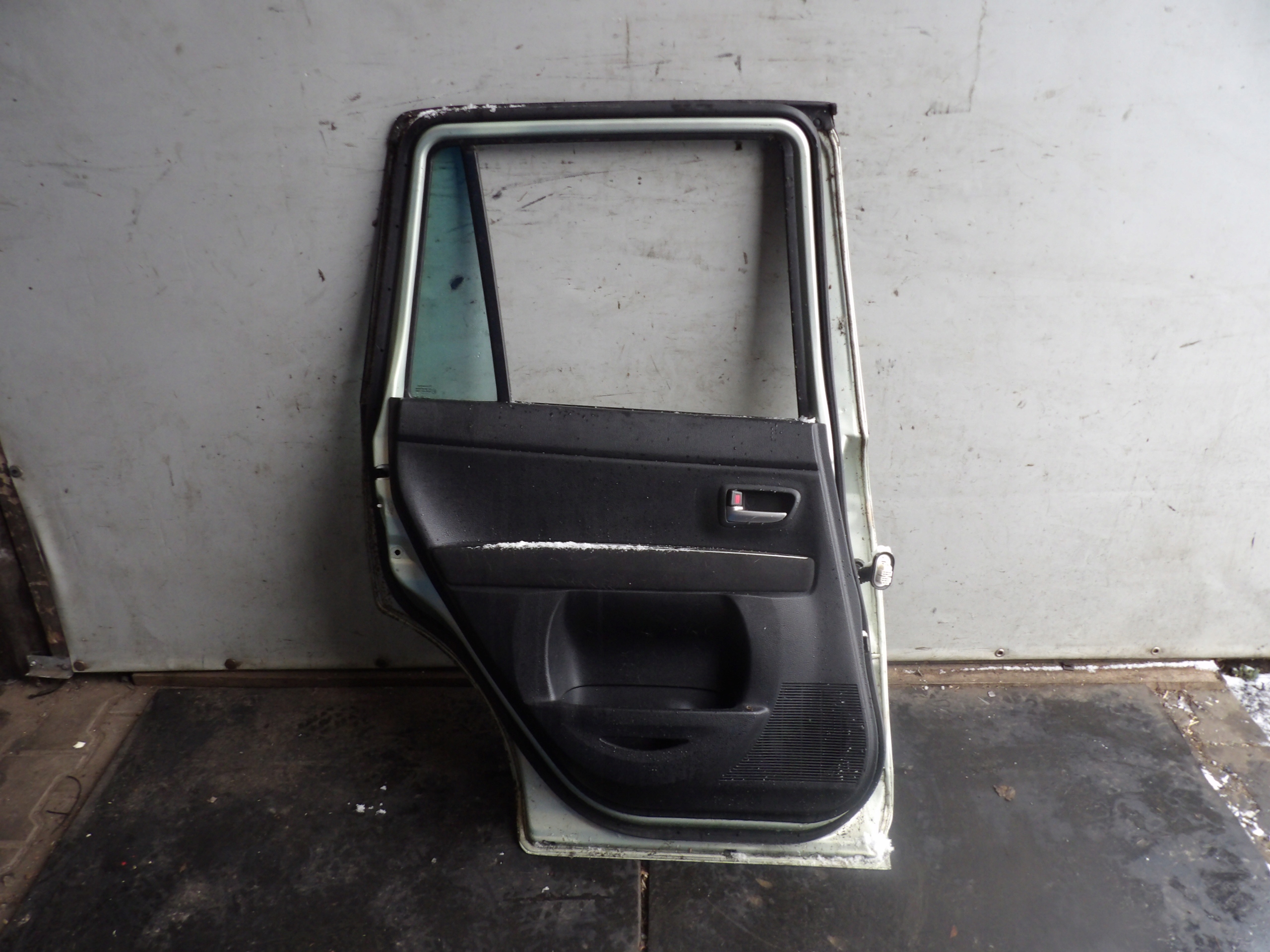 Mazda Demio II door rear. left HB 5D