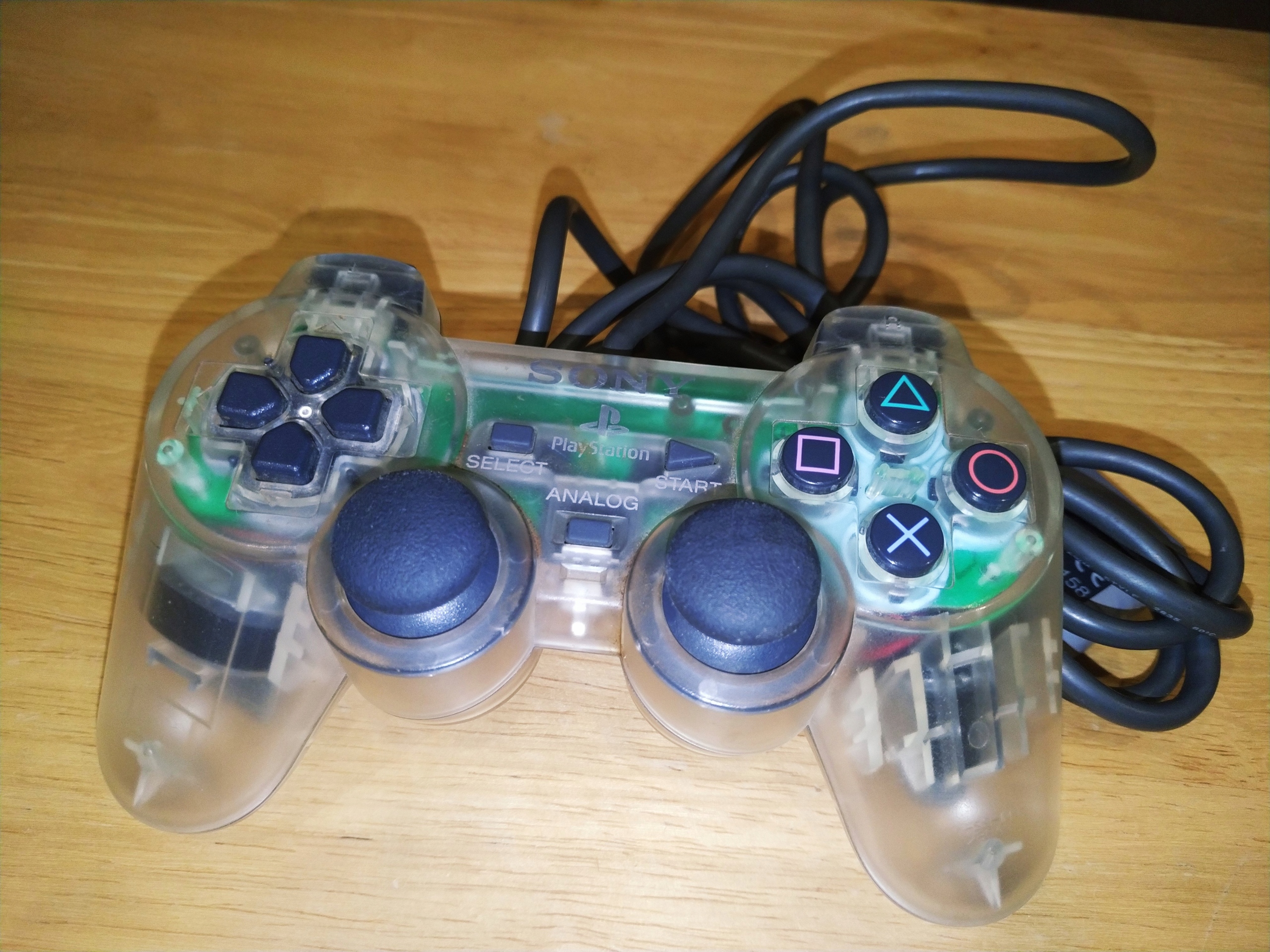 KONTROLER PAD PLAYSTATION PS1 DUALSHOCK PRZEŹROCZ.