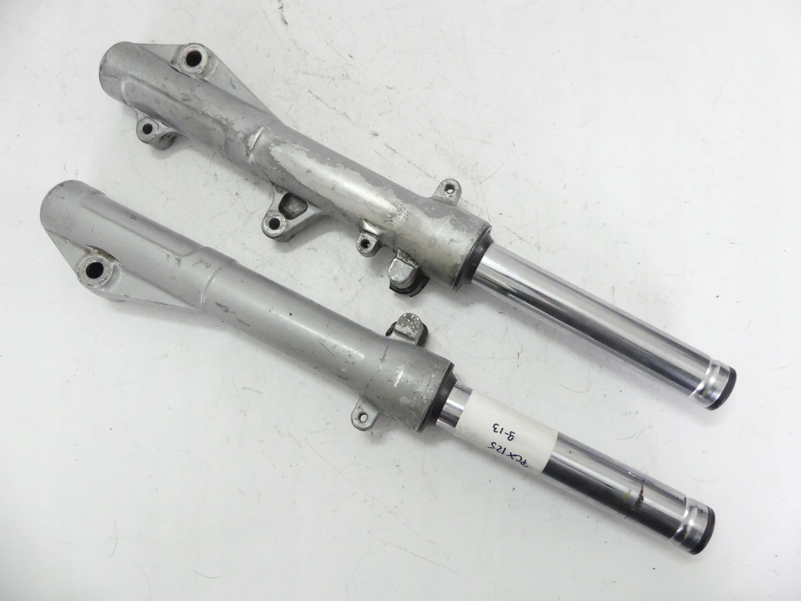 -10 - LAGA L + P ГОЛЕНЬ ПОДВЕСКА HONDA PCX 125 09 +