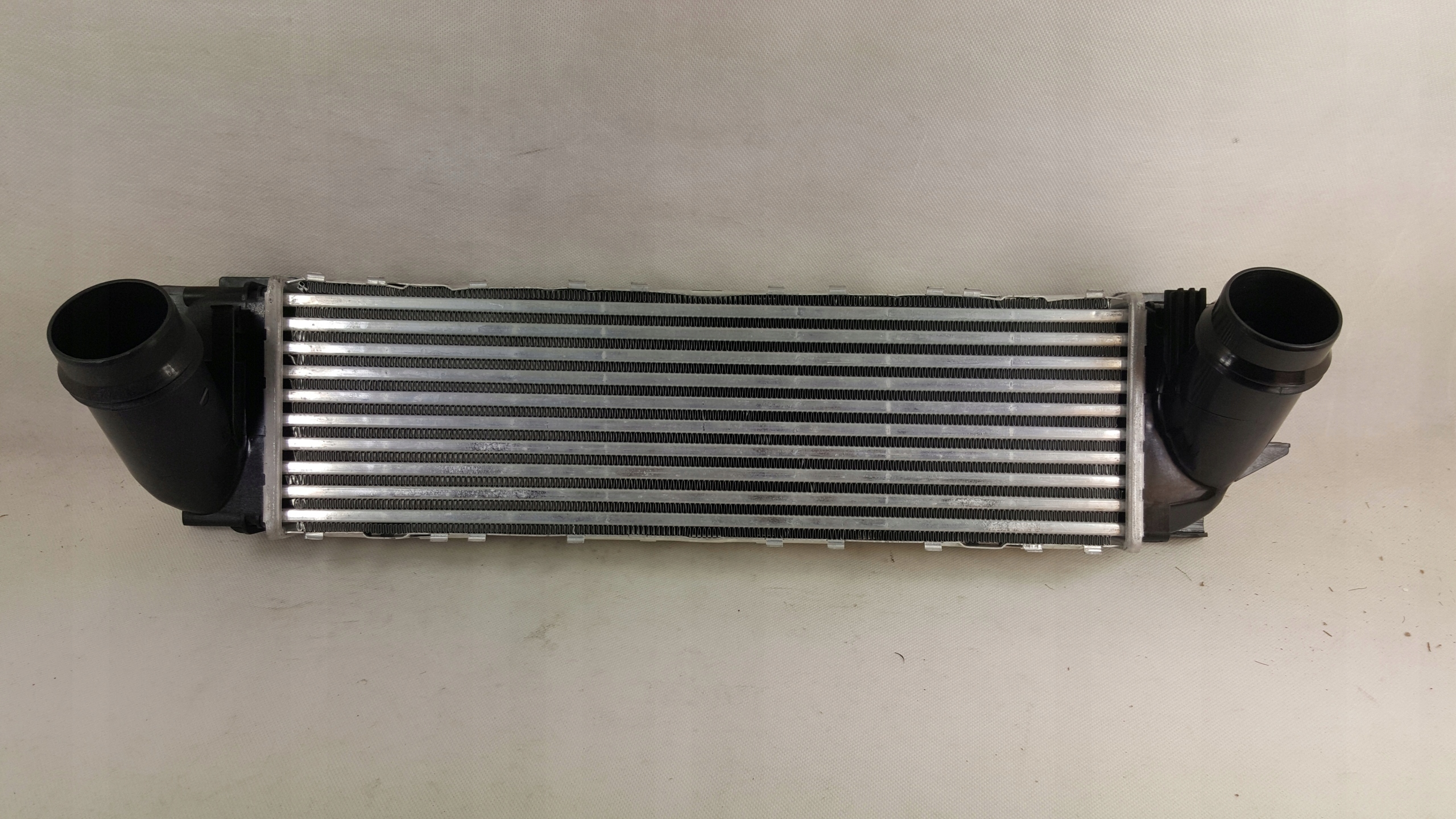 INTERCOOLER CHŁODNICA POWIETRZA X3 F25 2.0D NOWA