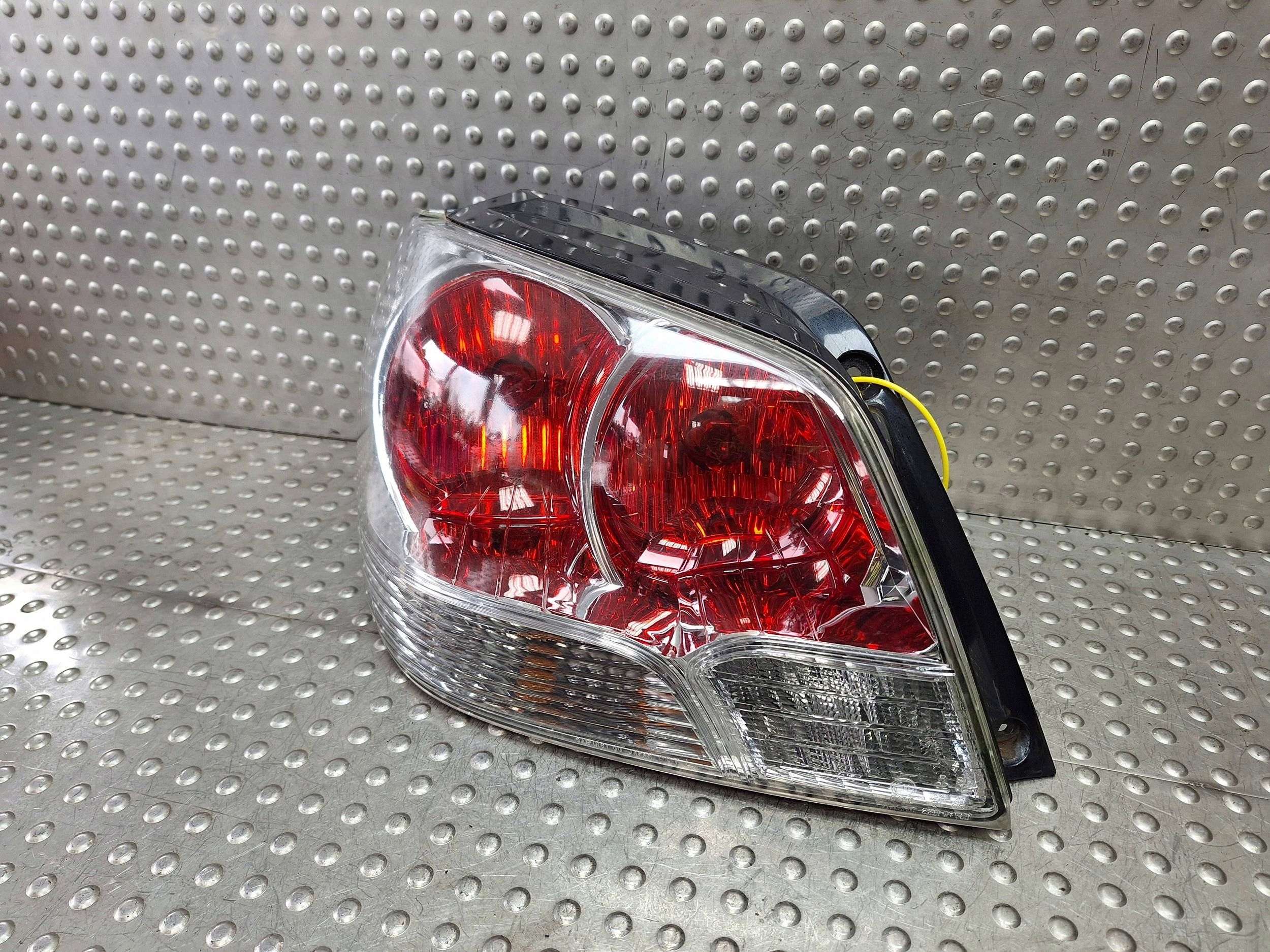 light rear part left MITSUBISHI OUTLANDER and 03-07 EUROPA