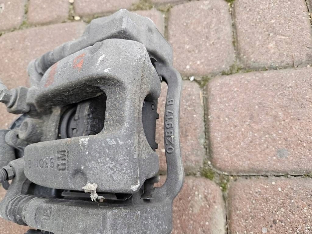 caliper rear part rear left zaciskowy jazmo 4x4 Opel Insignia B