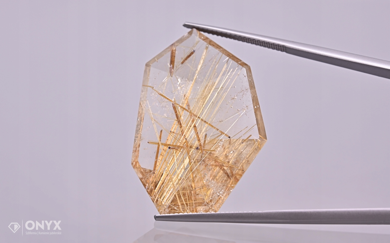 Křemen s rutilem fazetovaný nepravidelný 35x23,5 mm