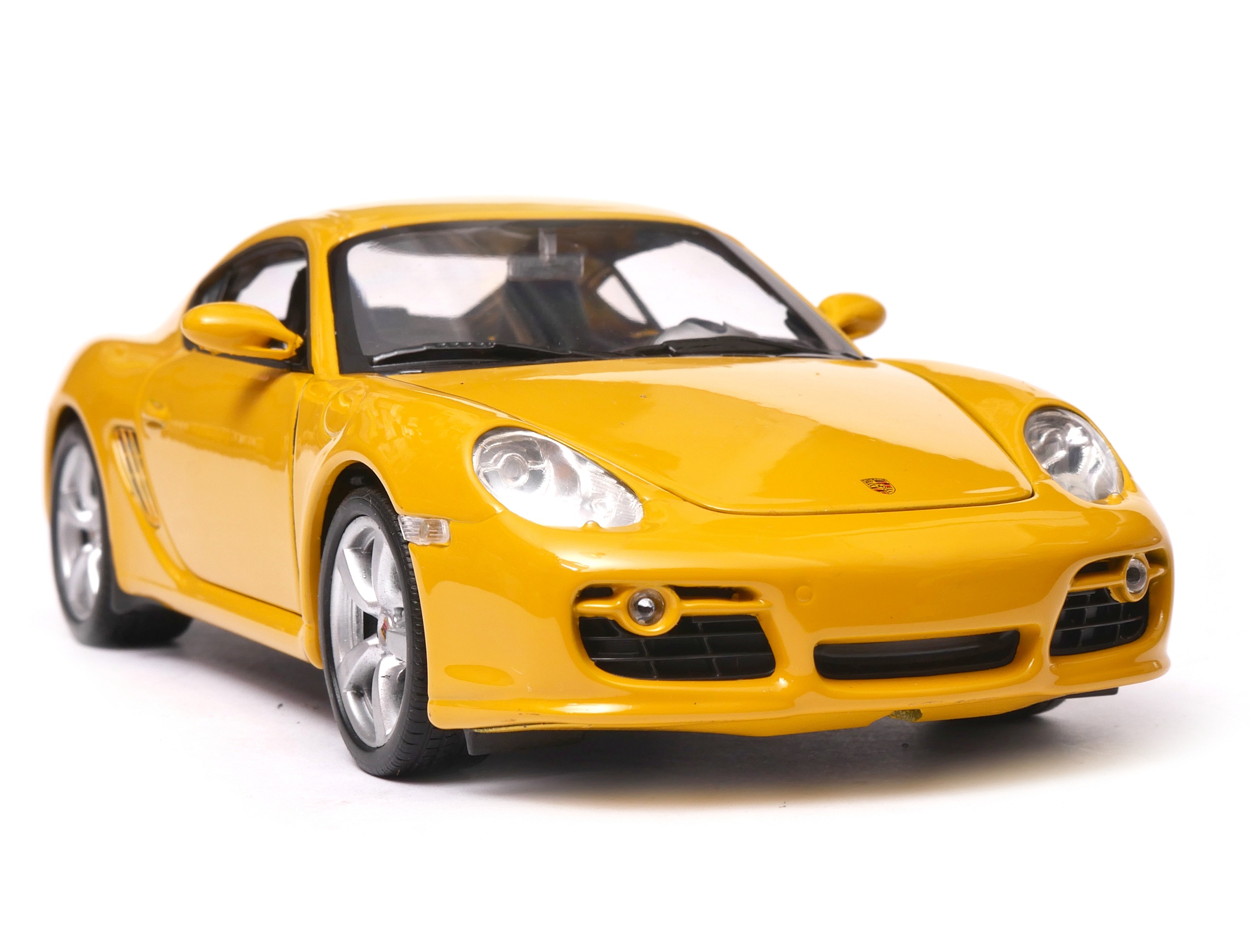 Porsche Cayman S 1:24 Welly 22488 žlutá