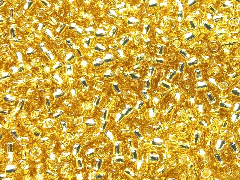 Koraliki Toho Round Silver-Lined Light Topaz 8/0-22