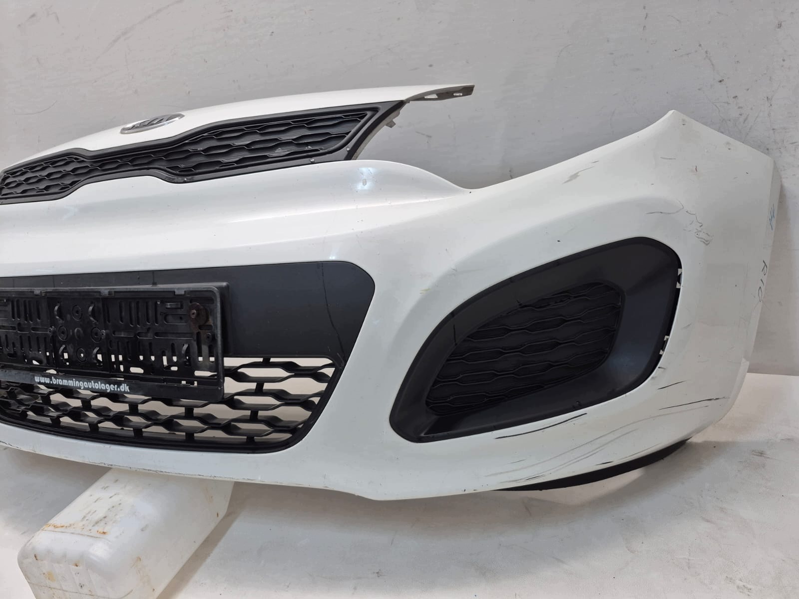 KIA RIO III 11- bumper front front grill grid 86511-1W200