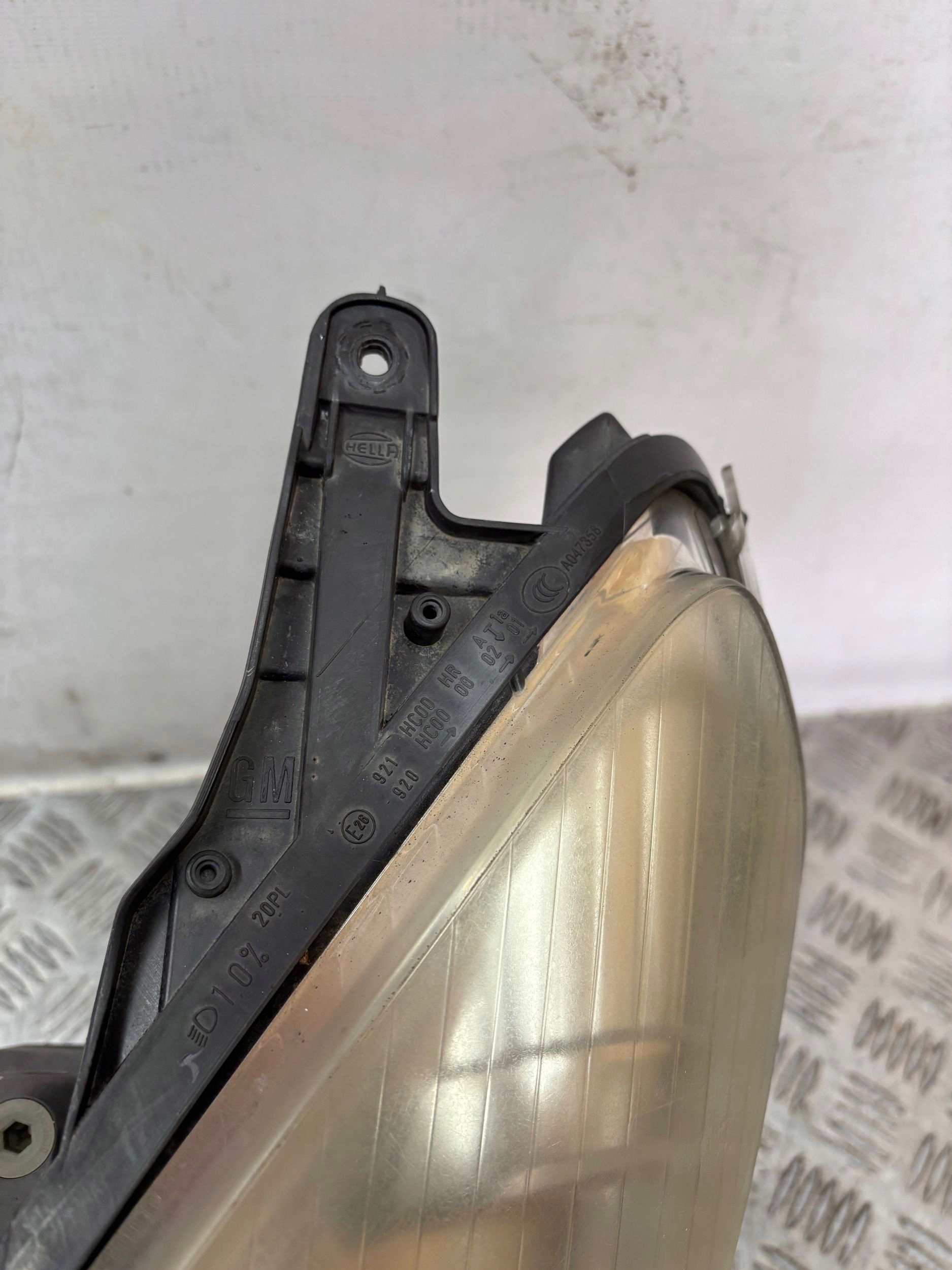REFLEKTOR light left OPEL ASTRA H 3 III LIFT 07