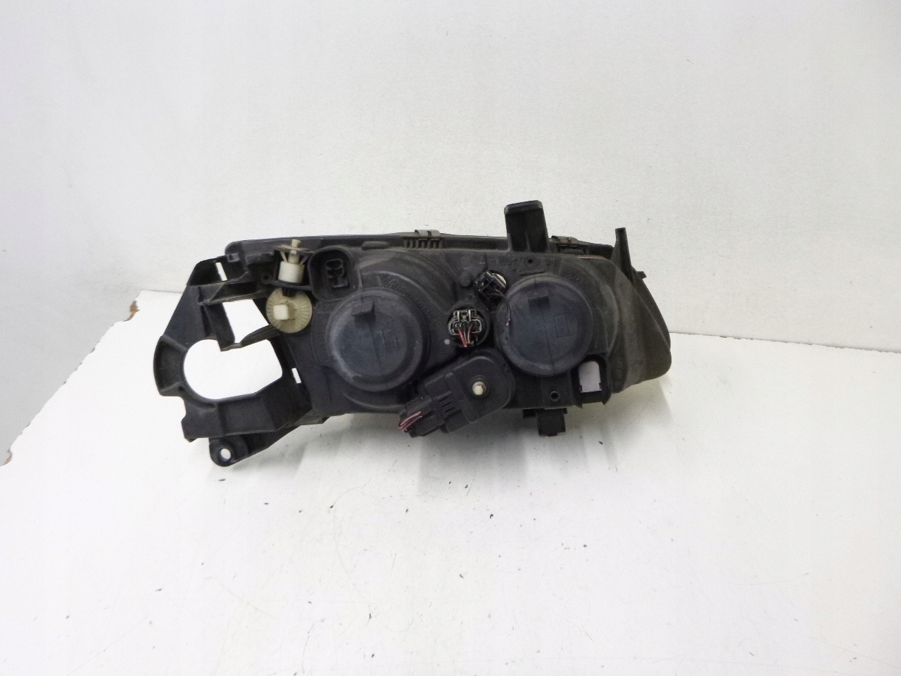 light front Nissan Almera N16 00-03r.