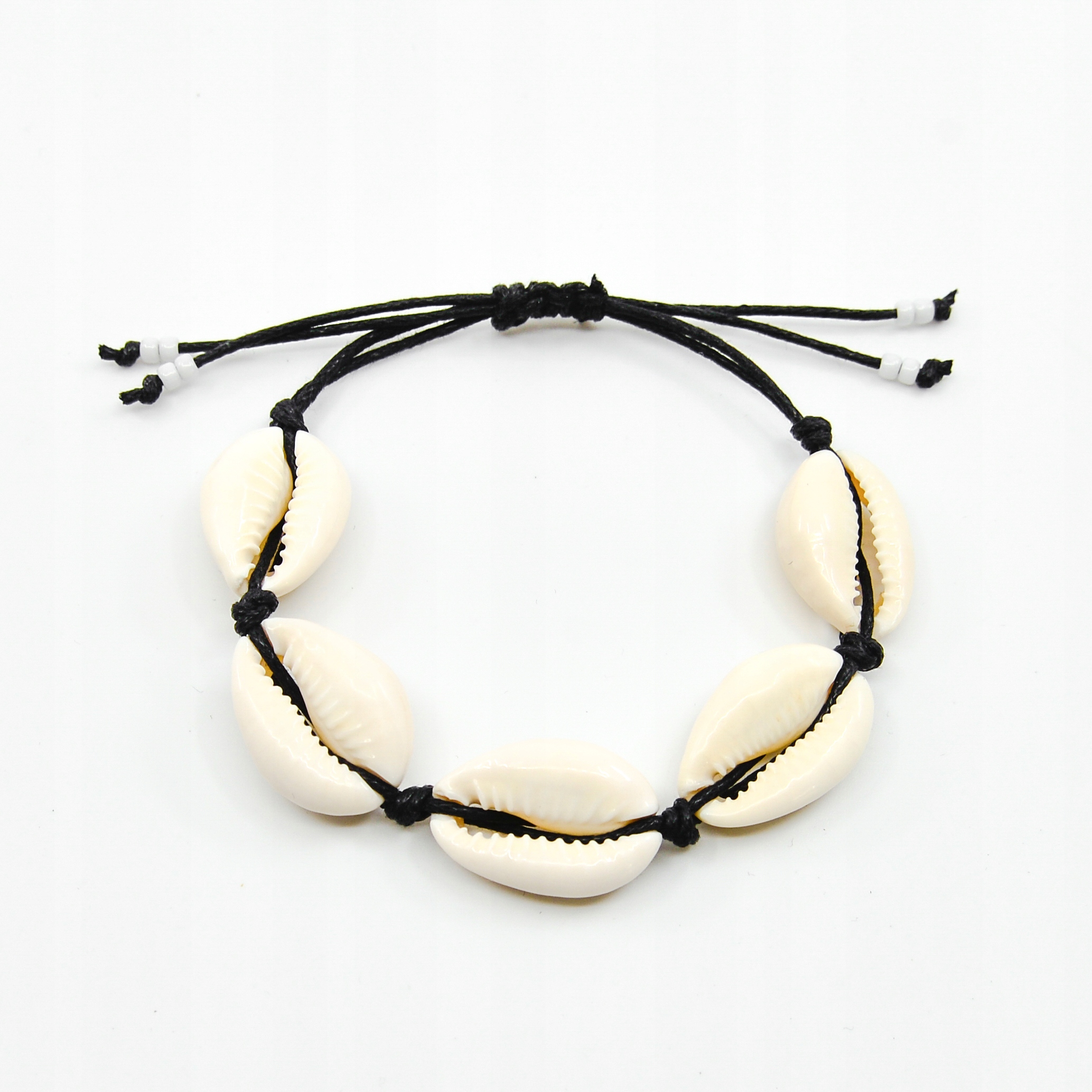 

Bransoletka muszle muszelki kauri bali Boho