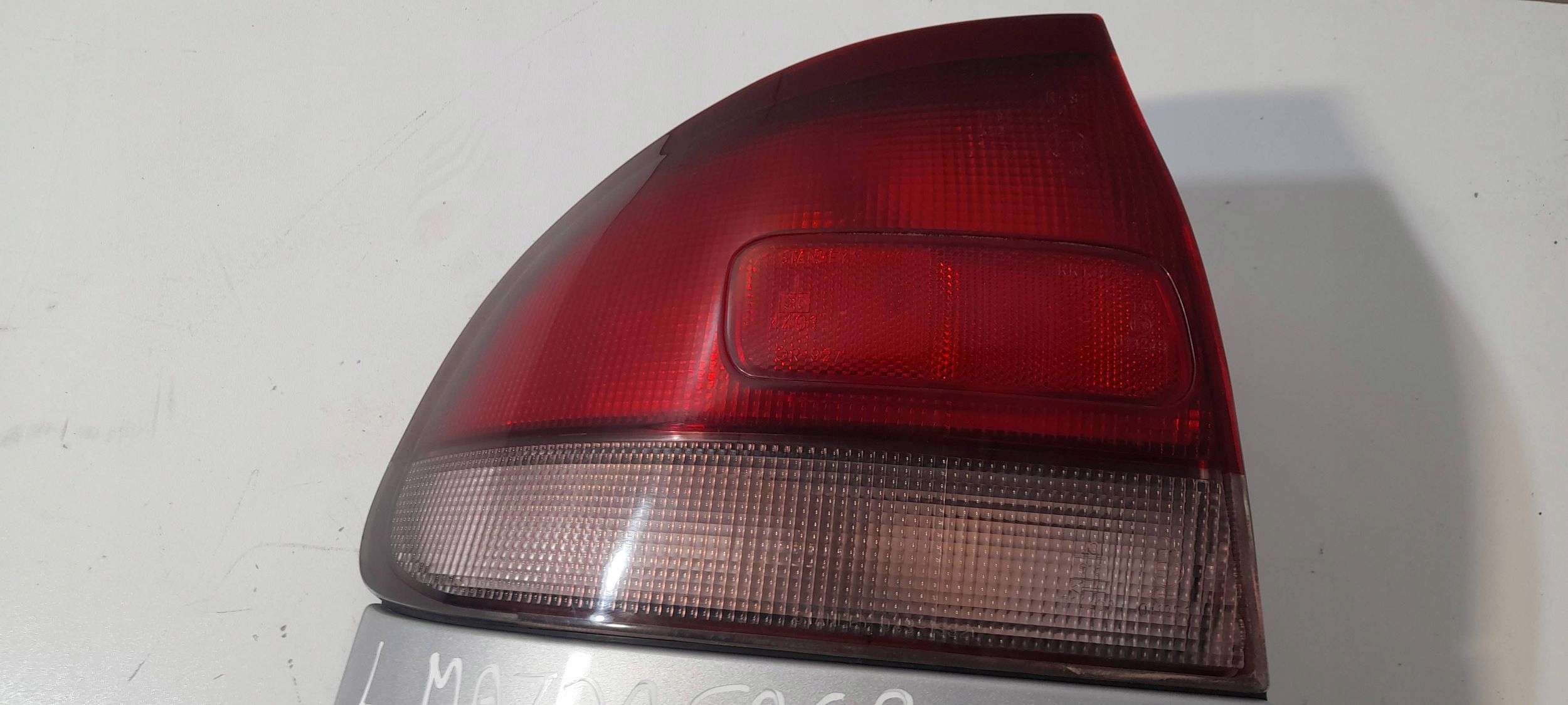 Mazda 626 sedan light rear left 0431392L (r483)