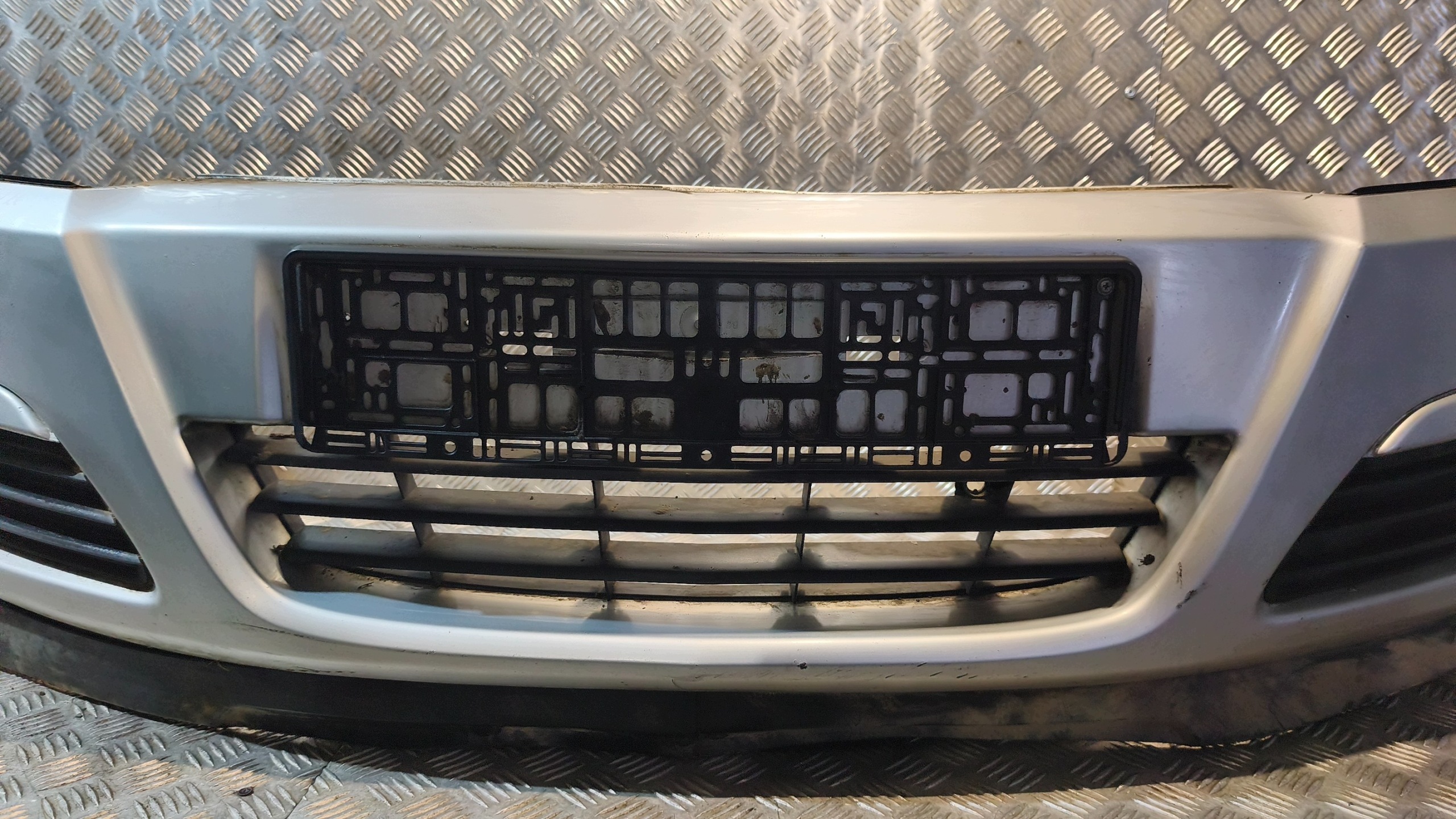 front bumper OPEL ASTRA H 2005r