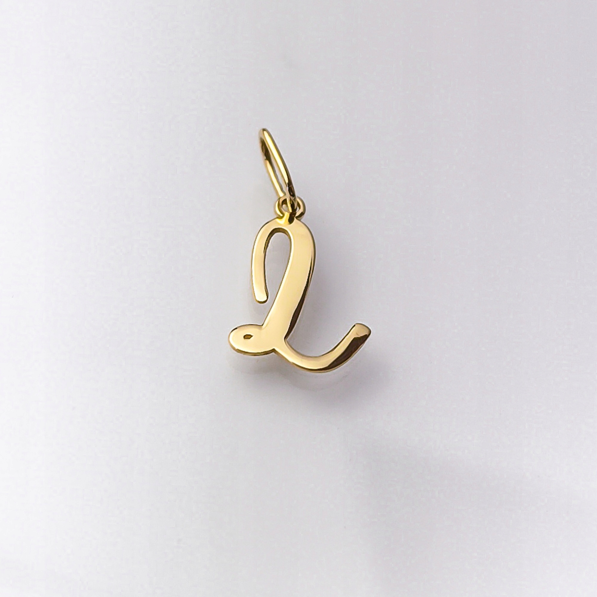 Zlatý přívěsek s písmenem L pr.585