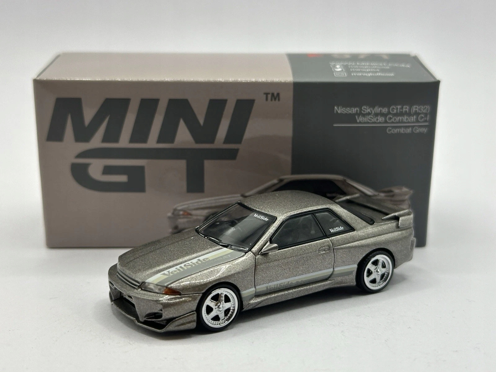 Mini GT #971 Nissan Skyline GT-R R32 VeilSide Combat C-I Combat Grey Szary Stan opakowania oryginalne