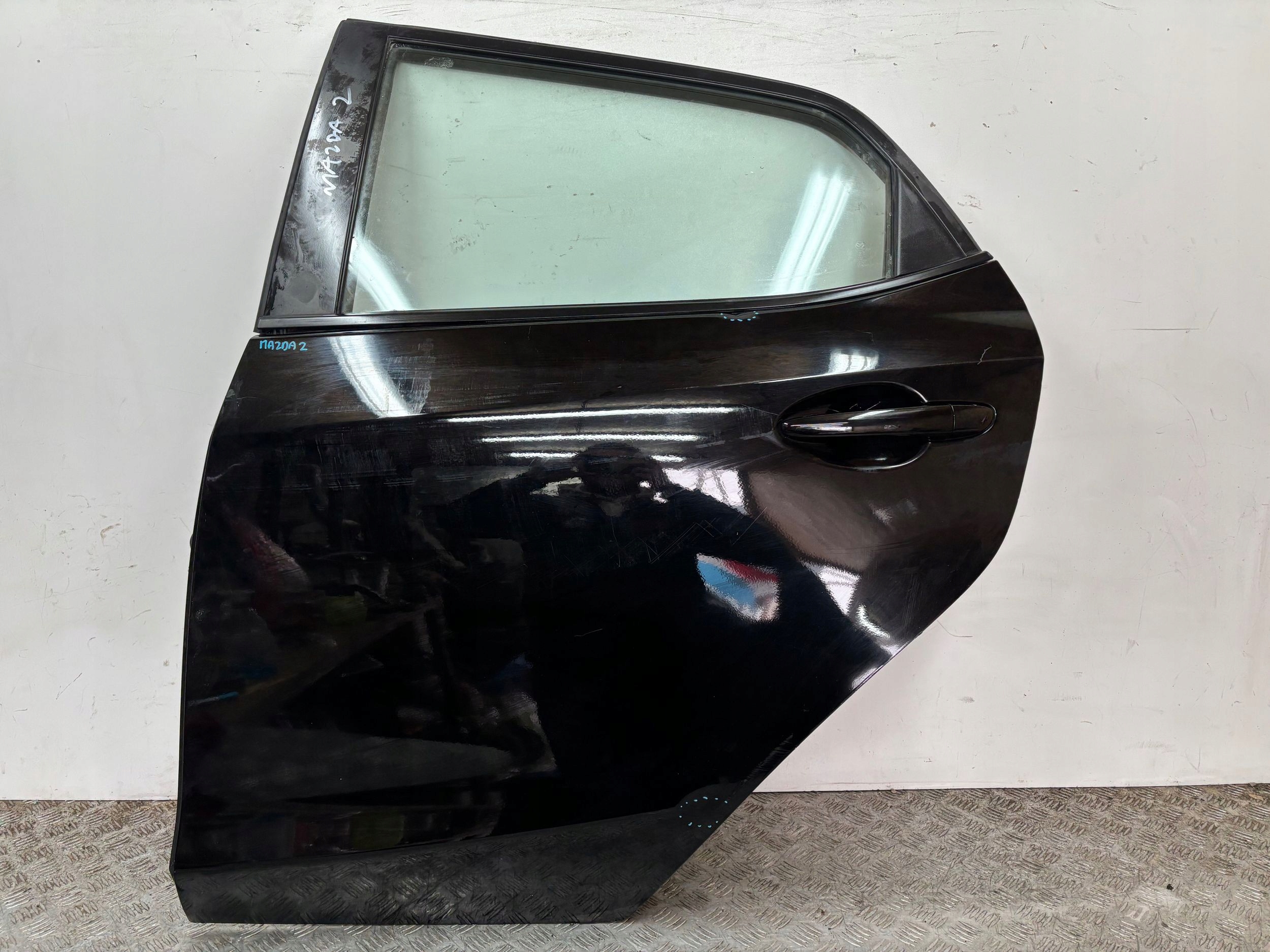 ajtó far hátsó bal MAZDA 2 DE 07